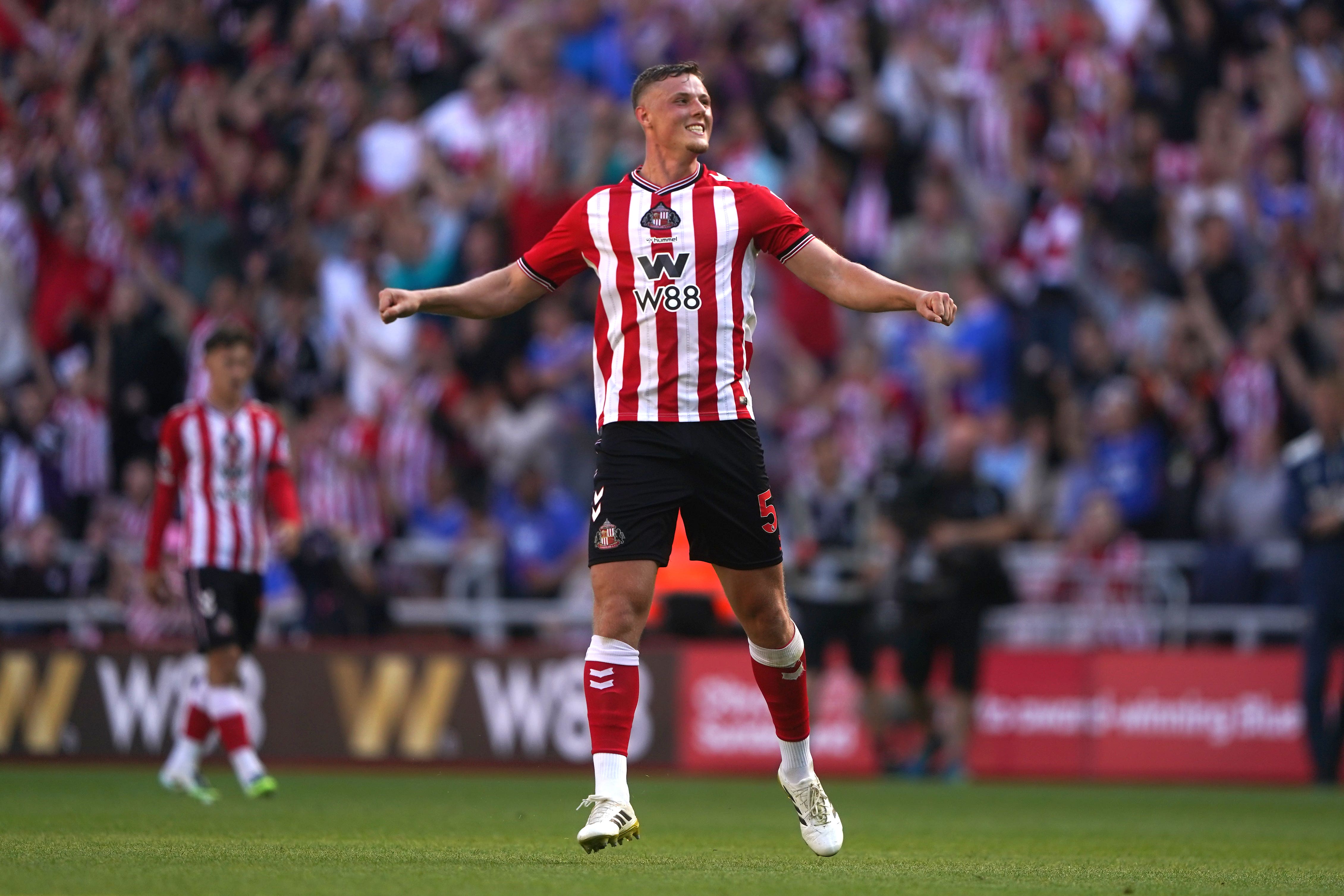 Dan Ballard celebrates victory after the final whistle (Owen Humphreys/PA)