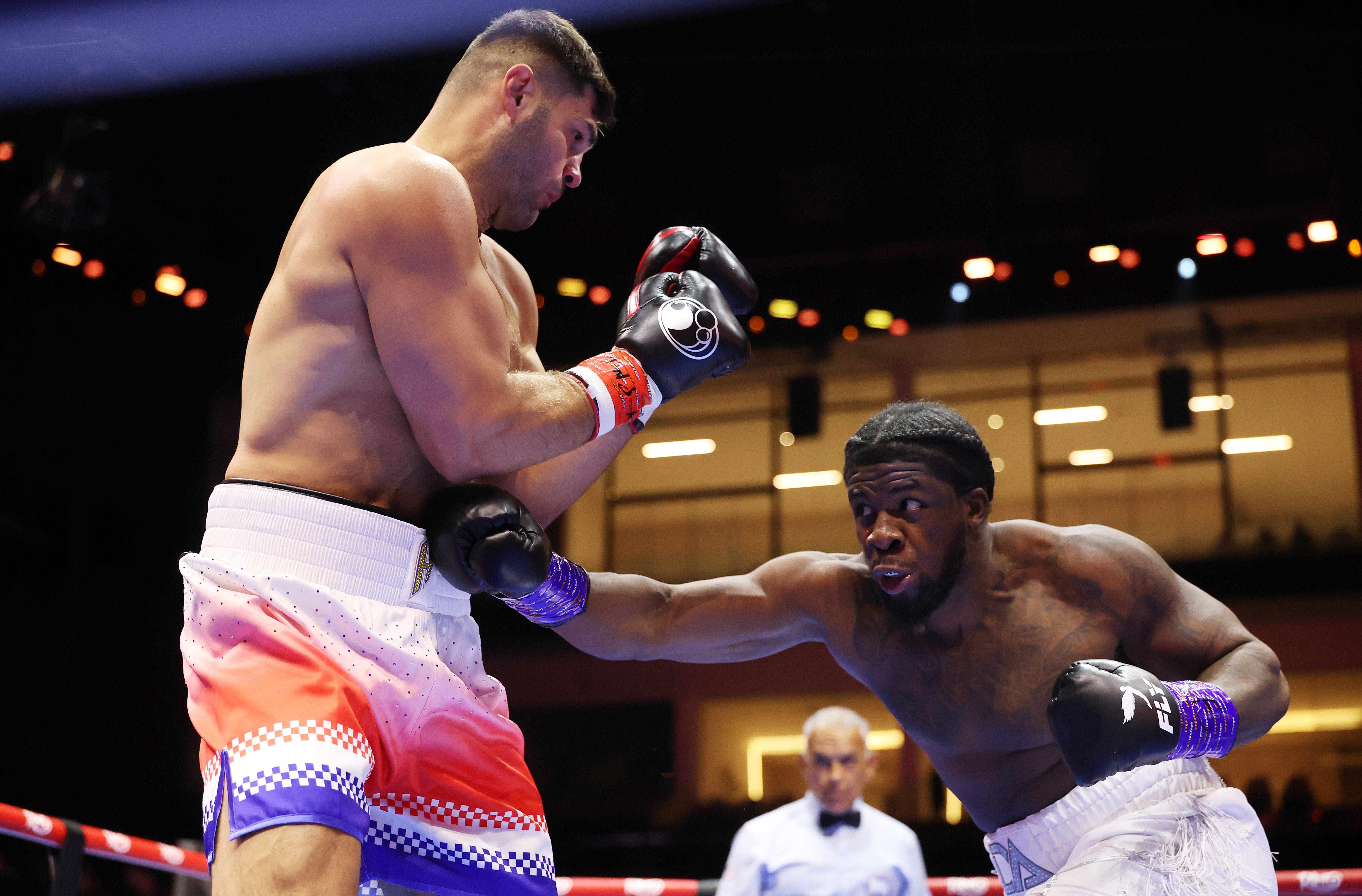 Filip Hrgovic (left) and David Adeleye get under way