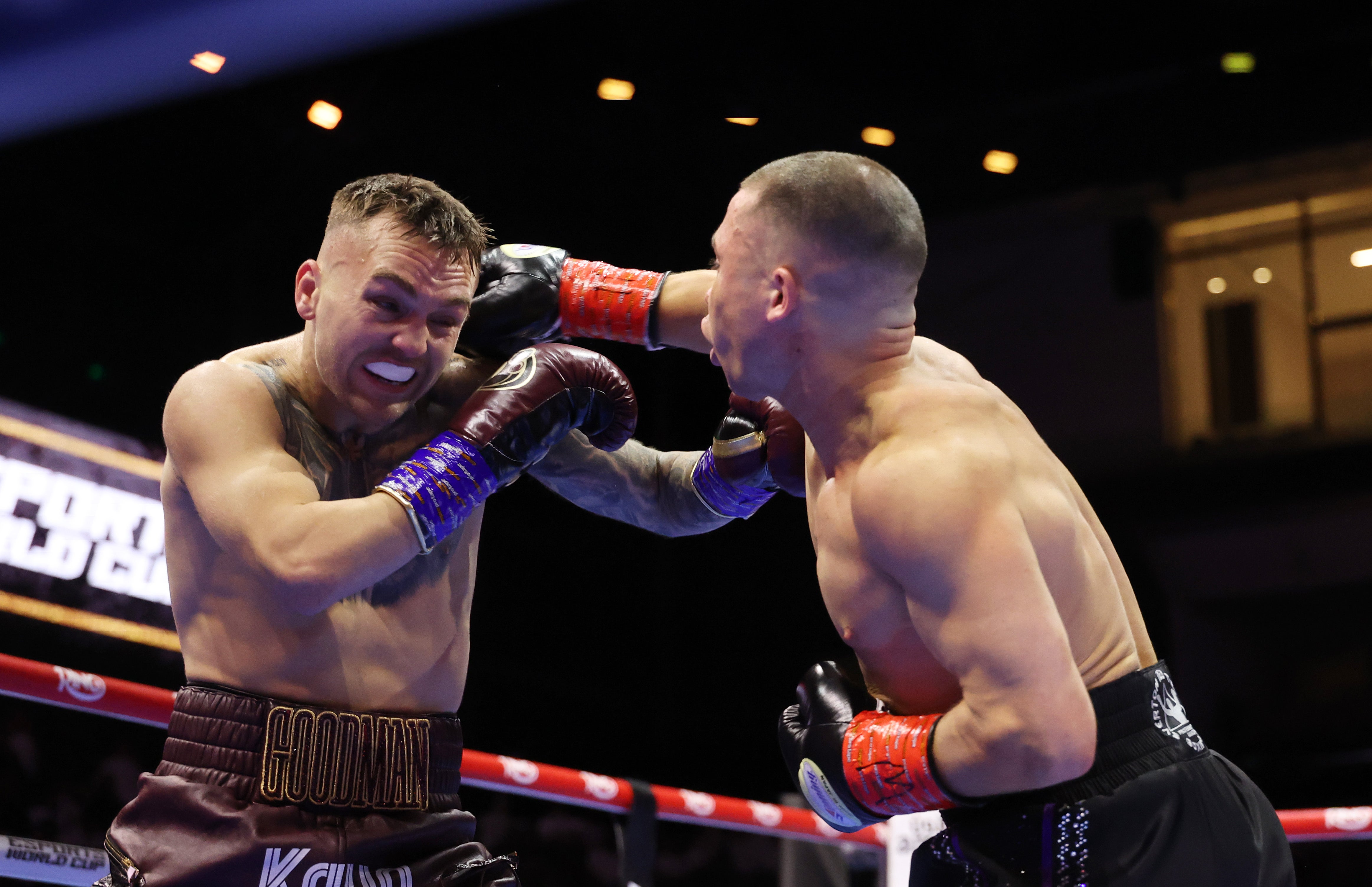 Nick Ball (left) lands a right hand on Sam Goodman