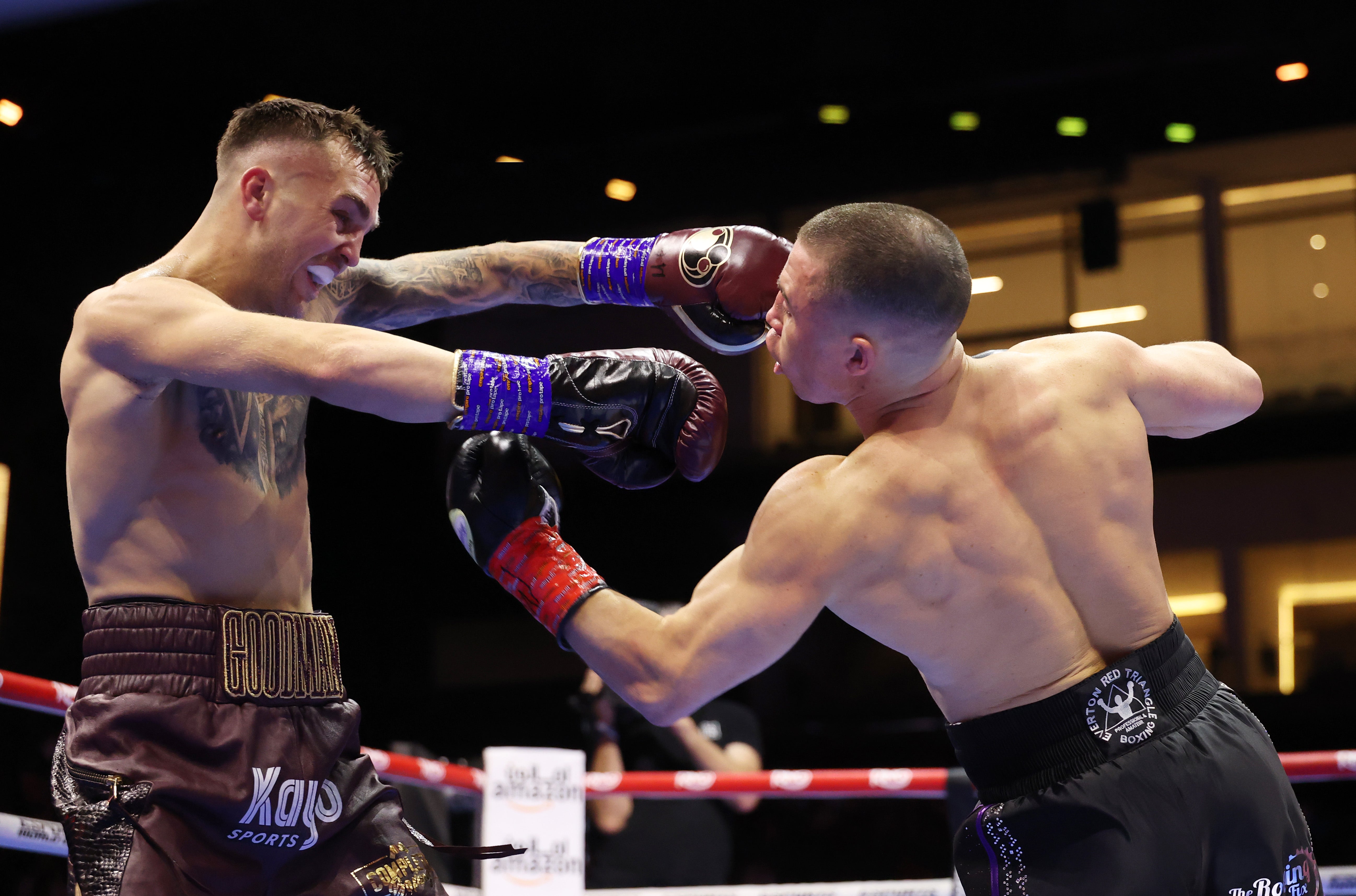 Nick Ball (right) trying to land on Sam Goodman