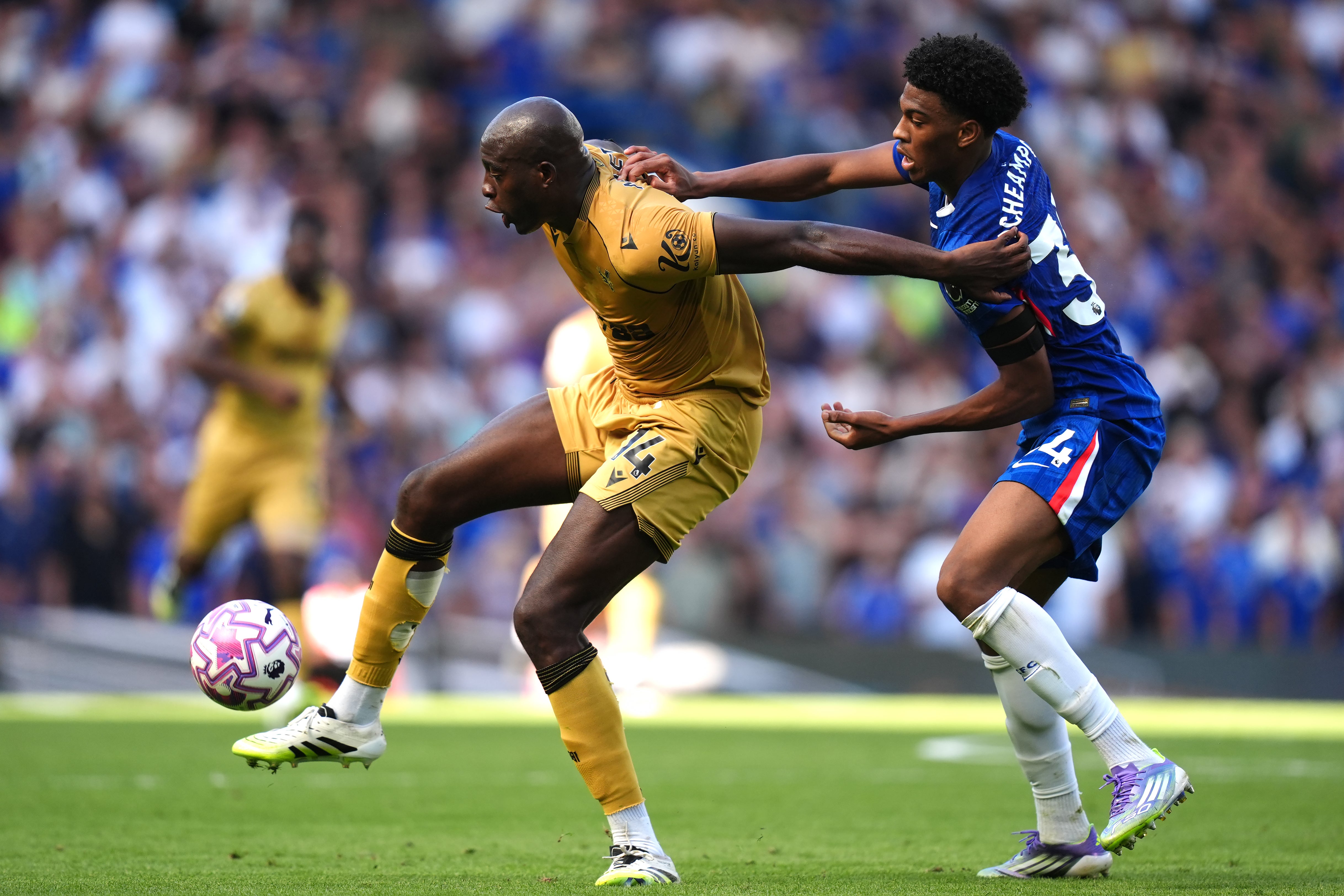 Crystal Palace's Jean-Philippe Mateta and Chelsea's Josh Acheampong battle for the ball