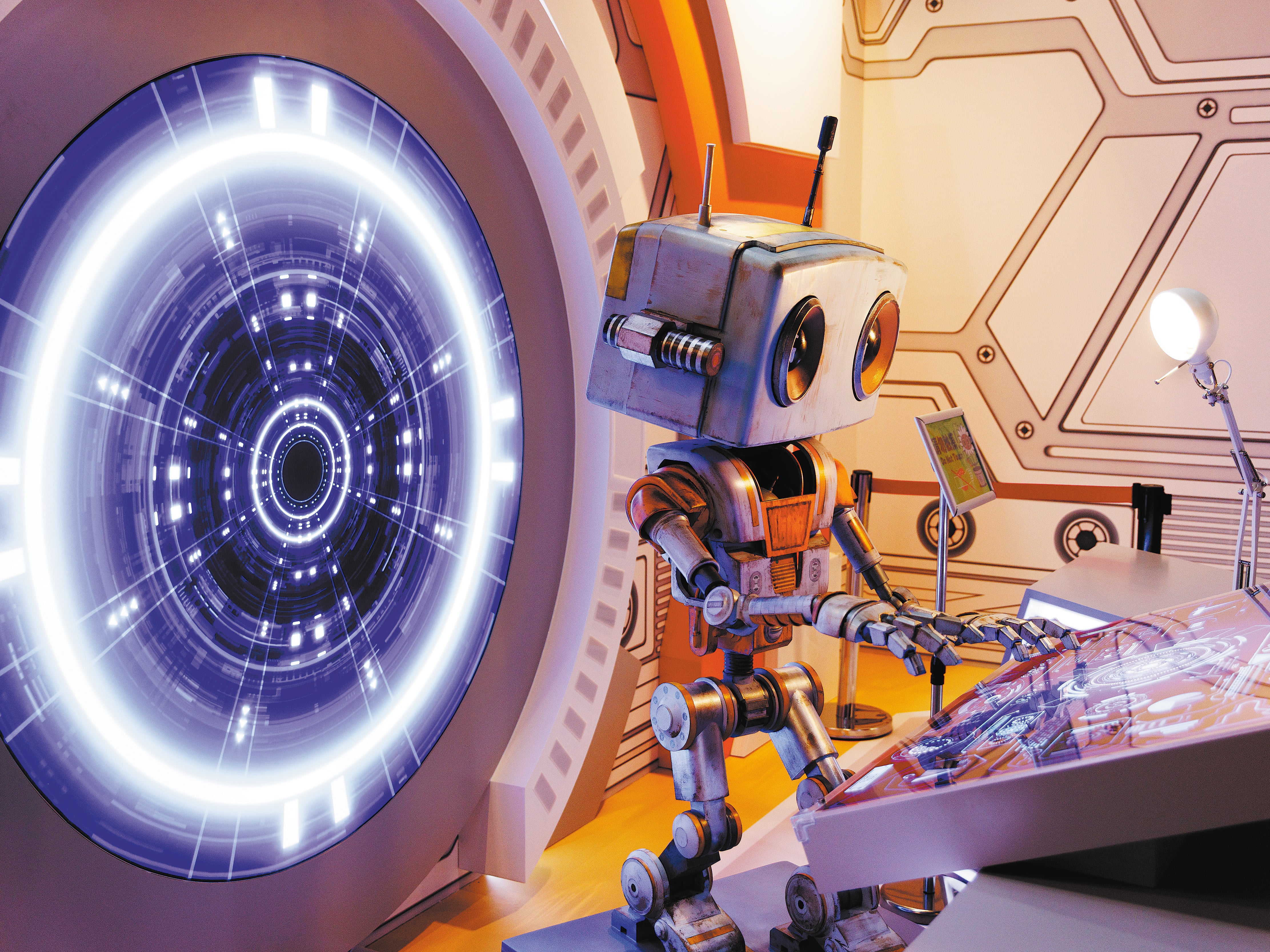 A humanoid robot puts on an exhibition during an aerospace sci-fi show at the China Science and Technology Museum in Beijing on 28 June