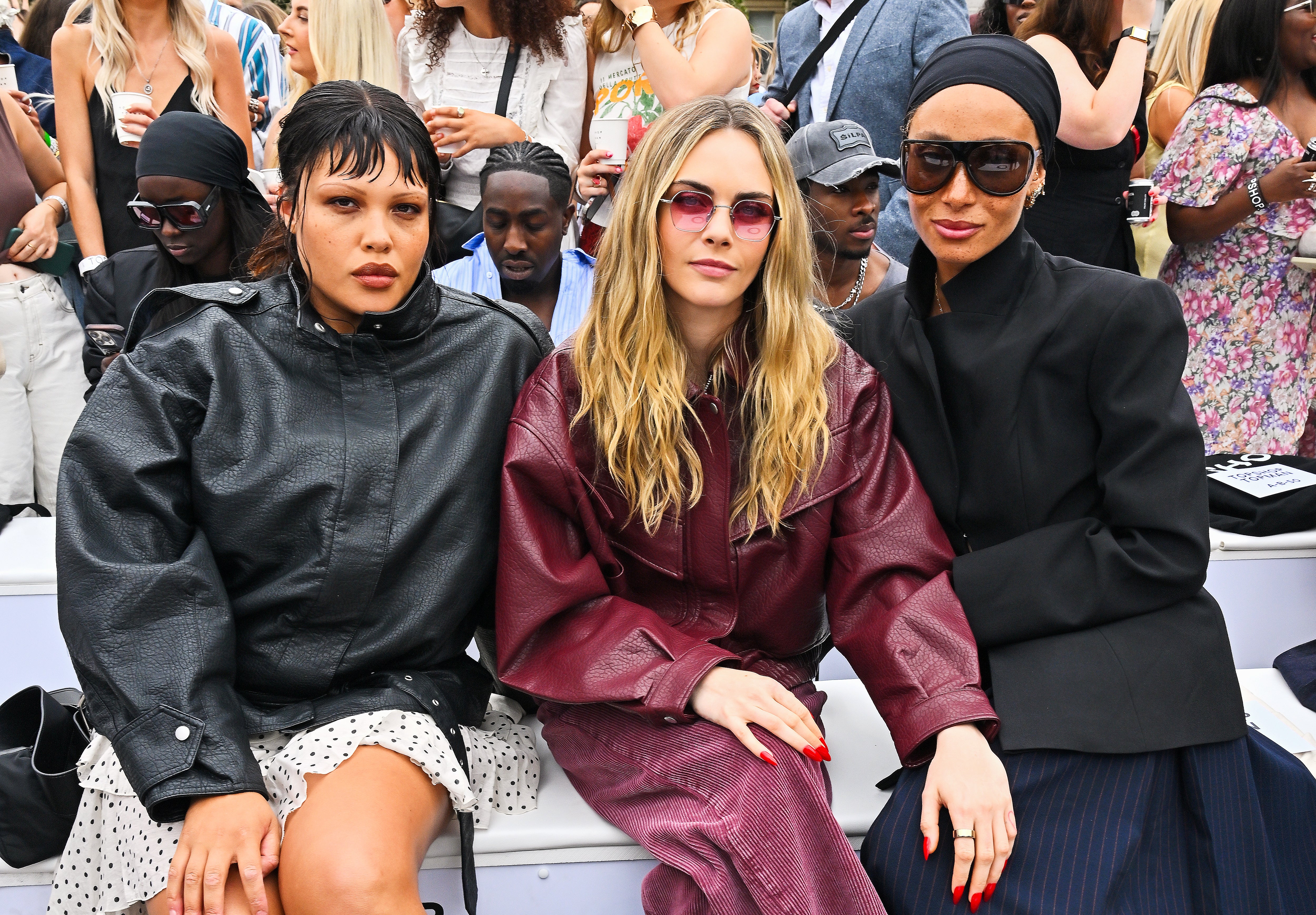 Alva Claire, Cara Delevingne and Adwoa Aboah at the show in Trafalgar Square