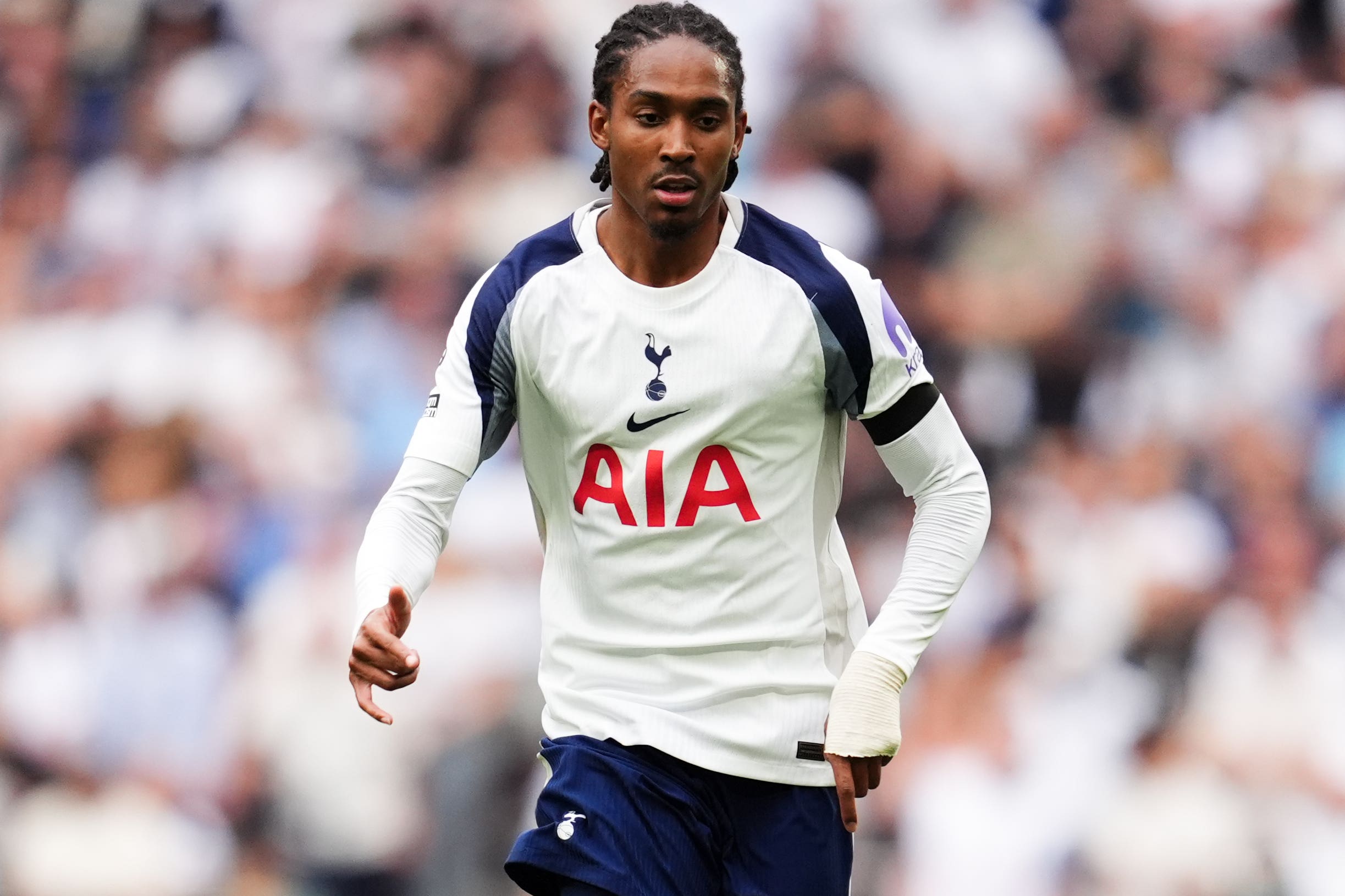 Djed Spence helped Tottenham begin the new Premier League season with a 3-0 win over Burnley (Adam Davy/PA)