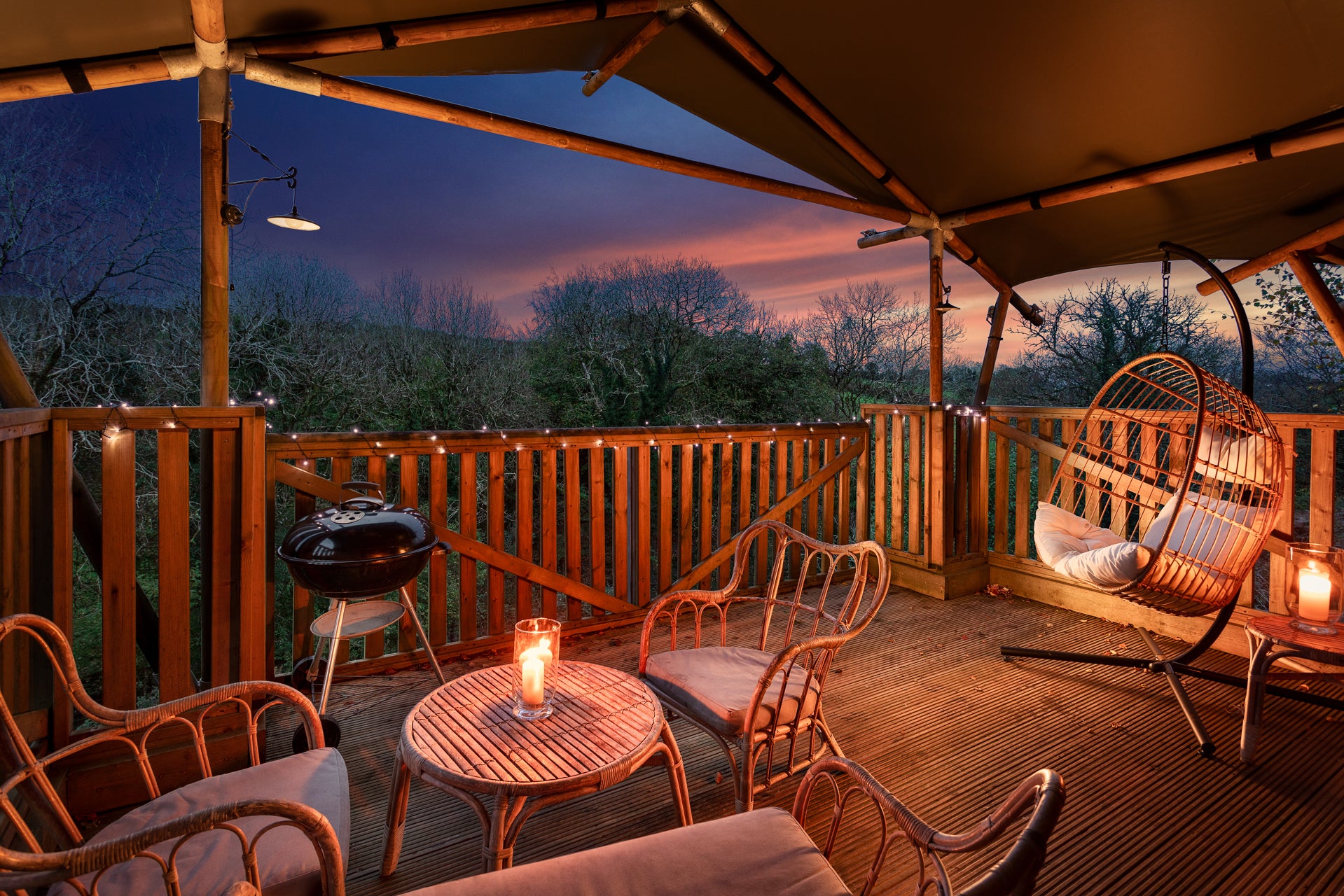 No need to forgo luxuries when camping with this raised safari tent nestled in a fold of Cornwall’s countryside