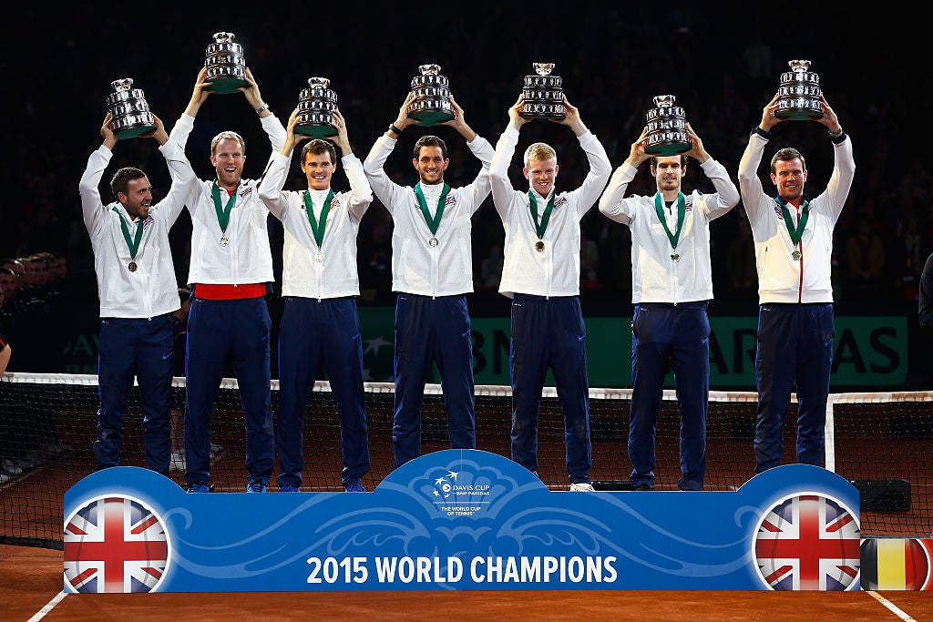 Kyle Edmund joins Andy Murray, Jamie Murray, James Ward and captain Leon Smith as Great Britain celebrate winning the Davis Cup