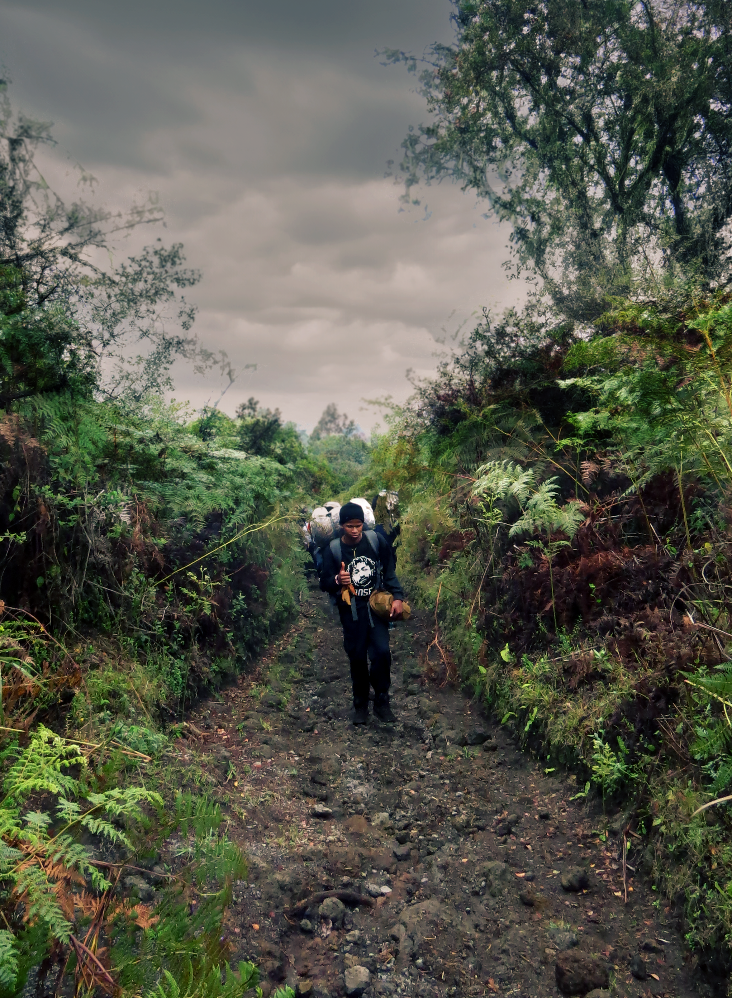 Student Solomon hikes to the summit of Kilimanjaro as part of his mountain guide training course