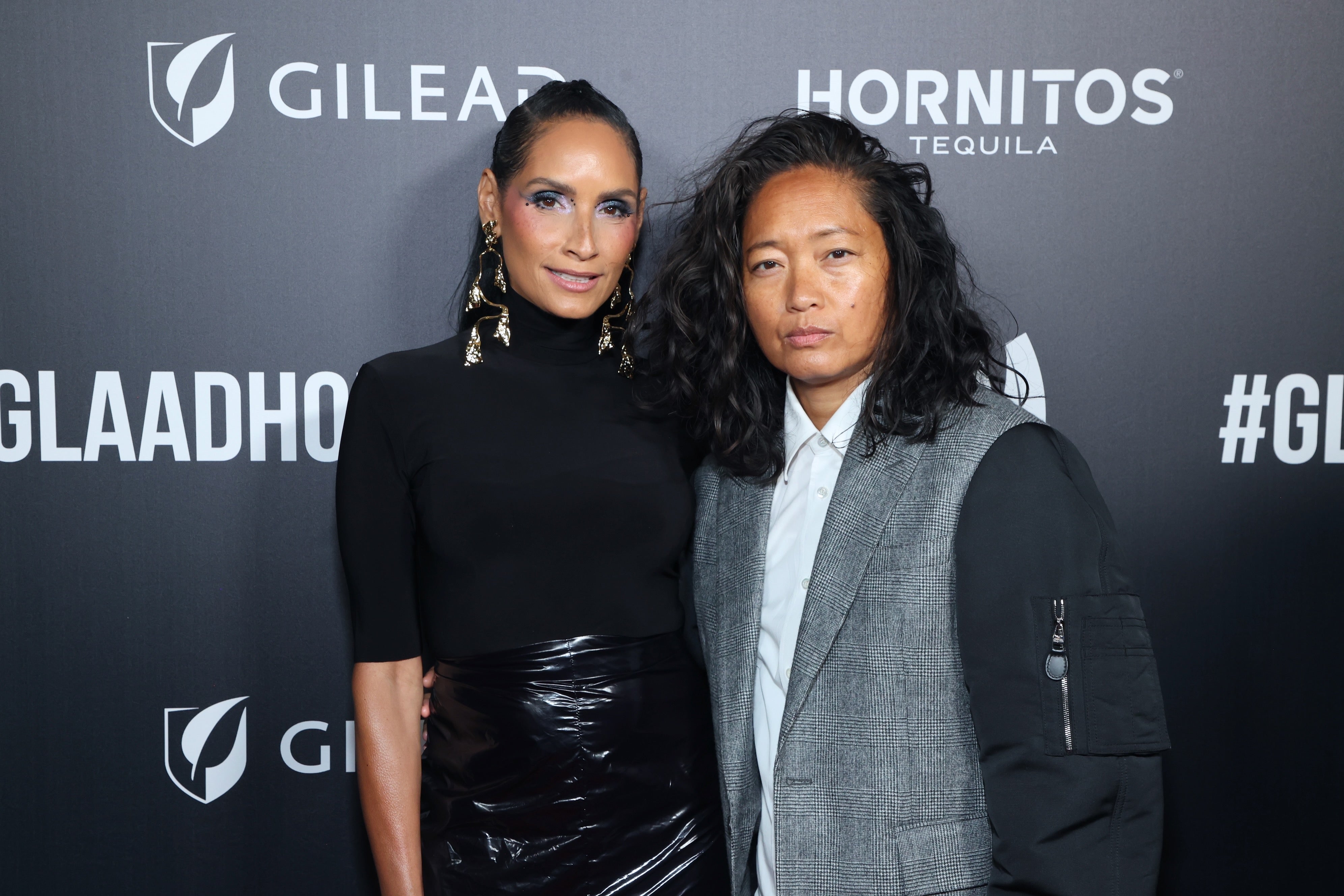 Racquel Chevremont (left) with her current fiancée, the “ludicrously hot” forensic neuropsychologist Mel Corpus. Chevremont, a cast member of the Real Housewives of New York City, is now suing her ex-fiancée Mickalene Thomas for a minimum of $10 million