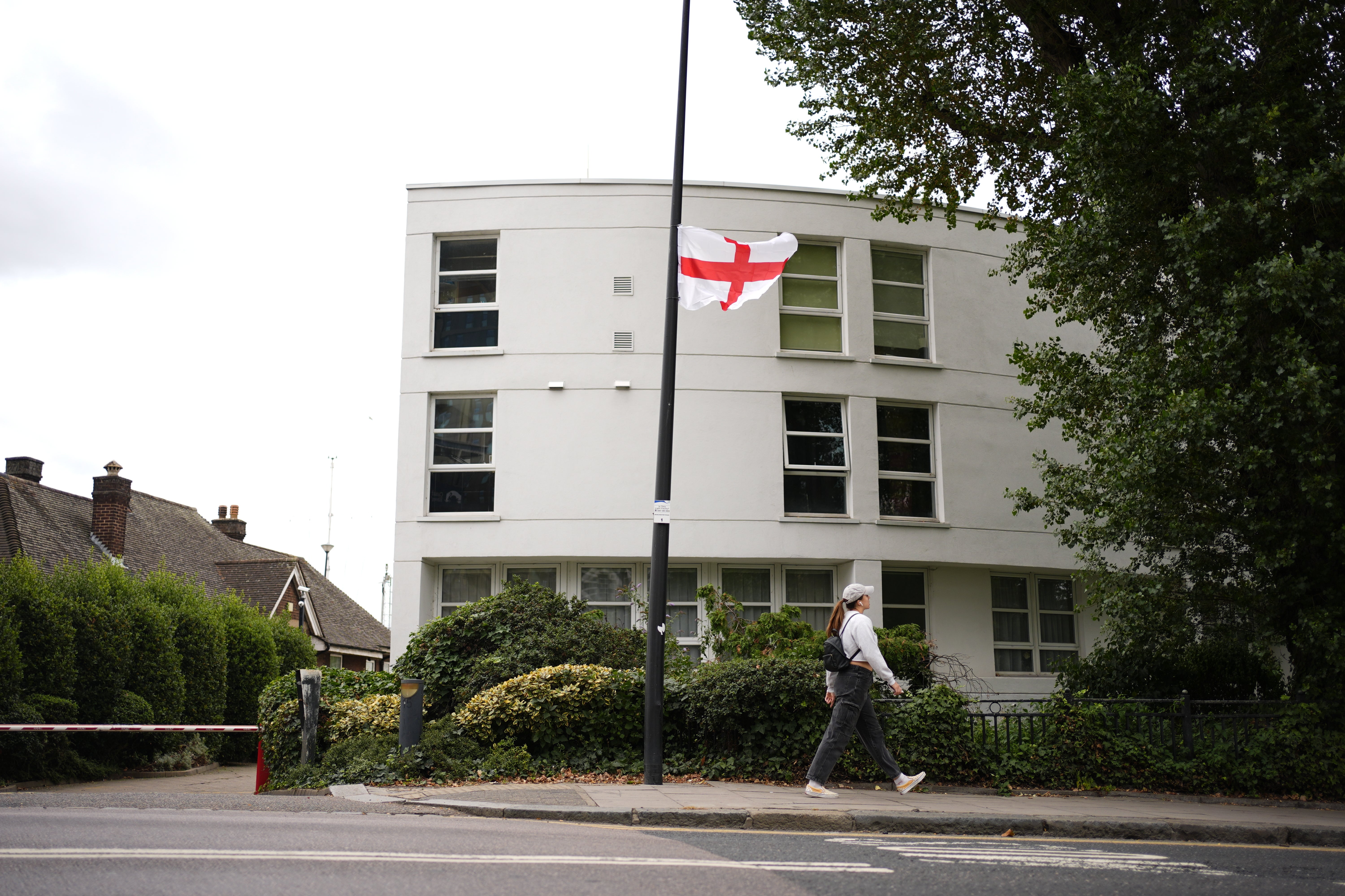A St George’s Cross flag near the A1206 in the Isle of Dogs (Jordan Pettitt/PA)