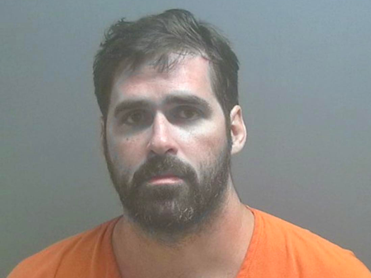 Murder suspect arrested in woods in his underwear after his ex’s new boyfriend was shot dead