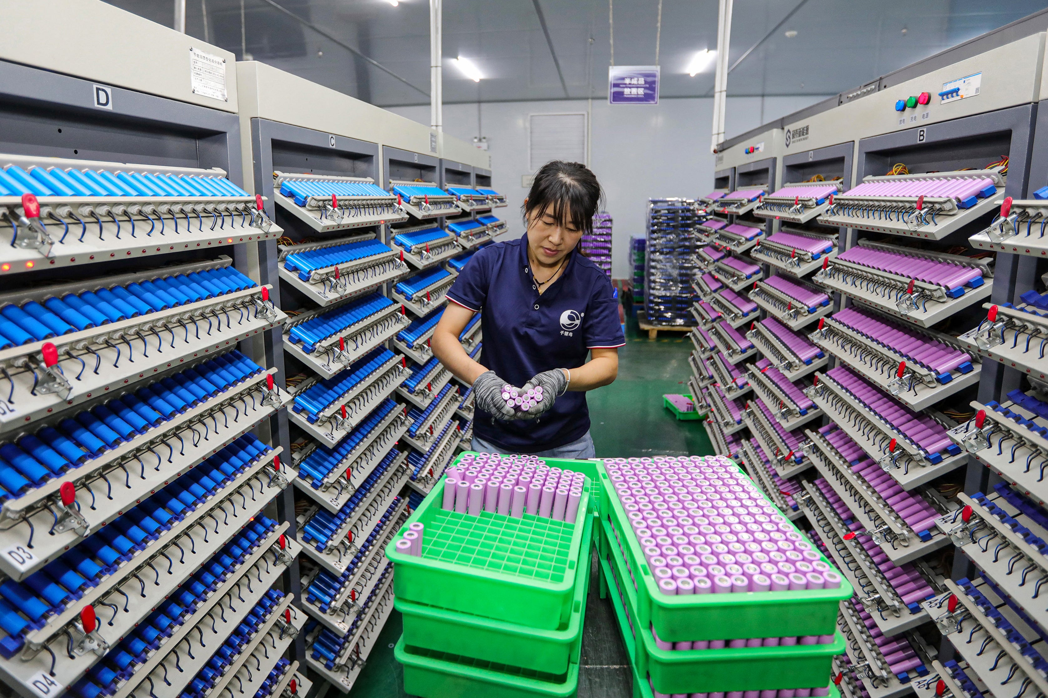 An employee works at a company manufacturing lithium batteries in Huaibei