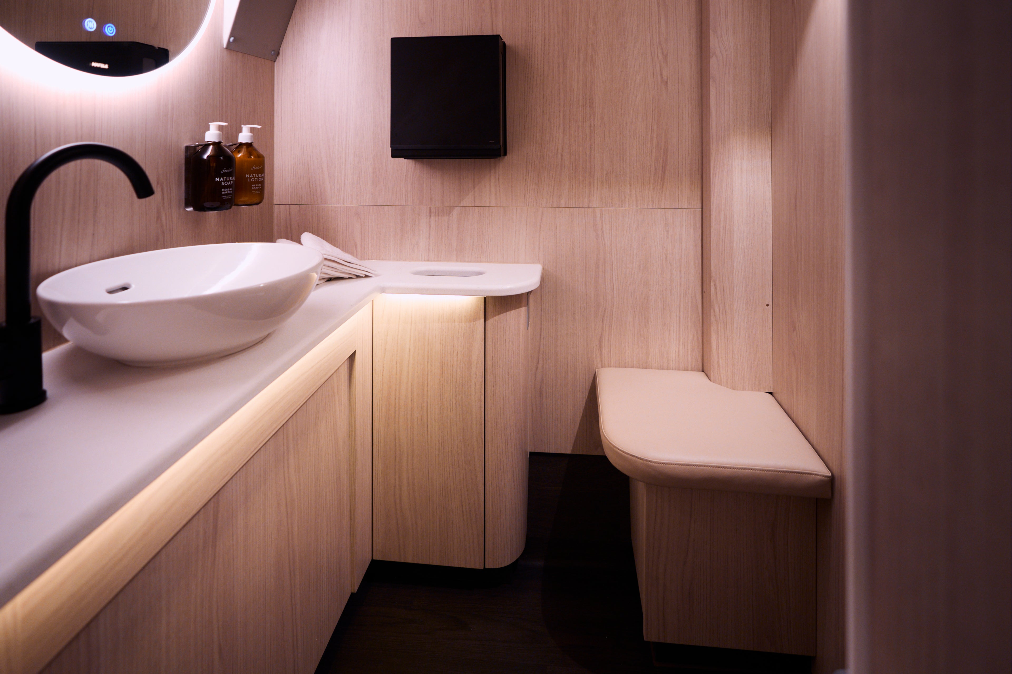 A toilet and a changing room can be found on board