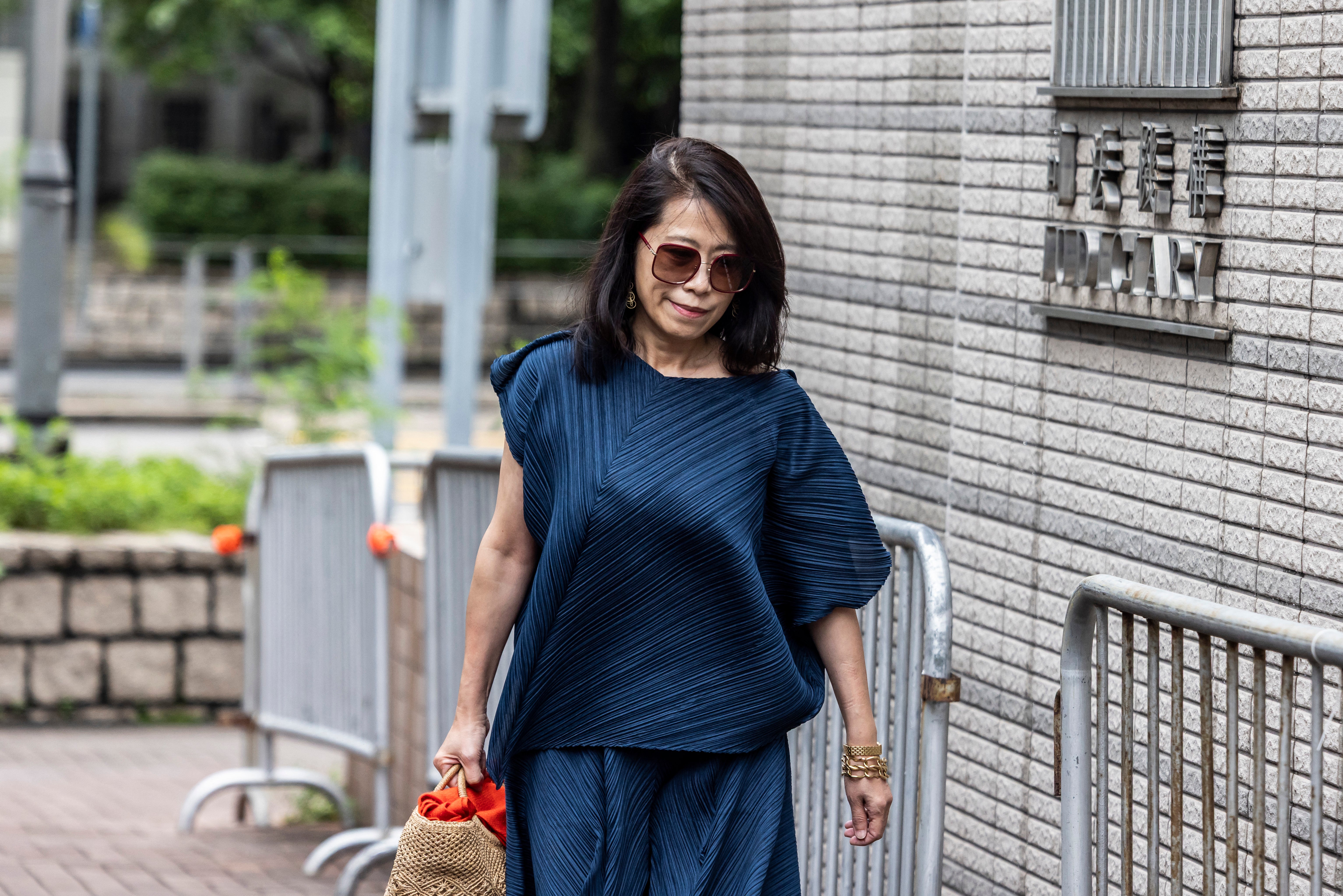 Teresa Lai, wife of Hong Kong media mogul Jimmy Lai, arrives at the West Kowloon court where his national security trial is being held on 18 August 2025