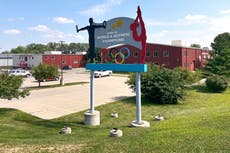 Years after abuse reports, ex-coach at renowned US gymnastics academy is arrested by FBI