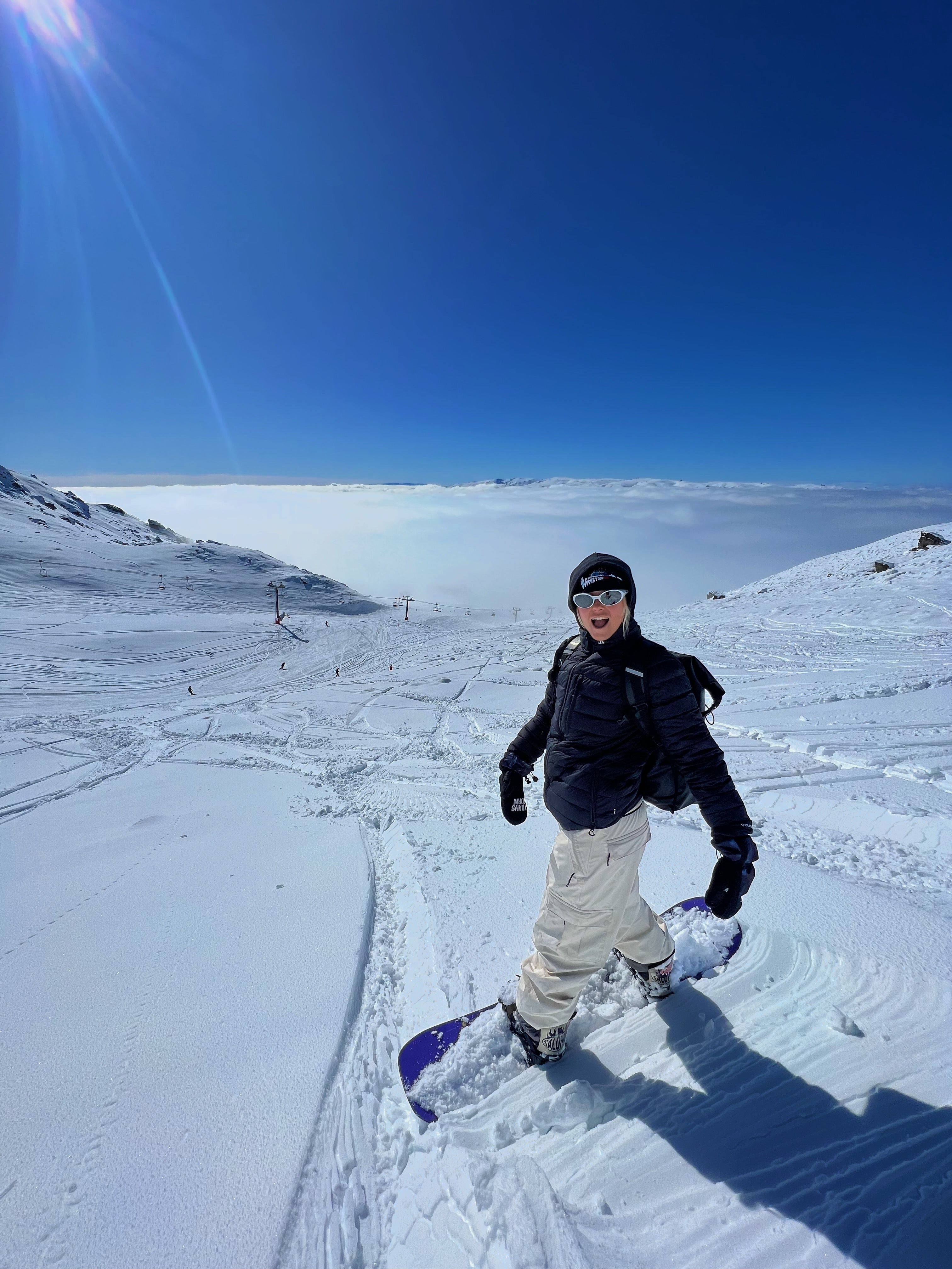 Maisie Hill on her snowboard