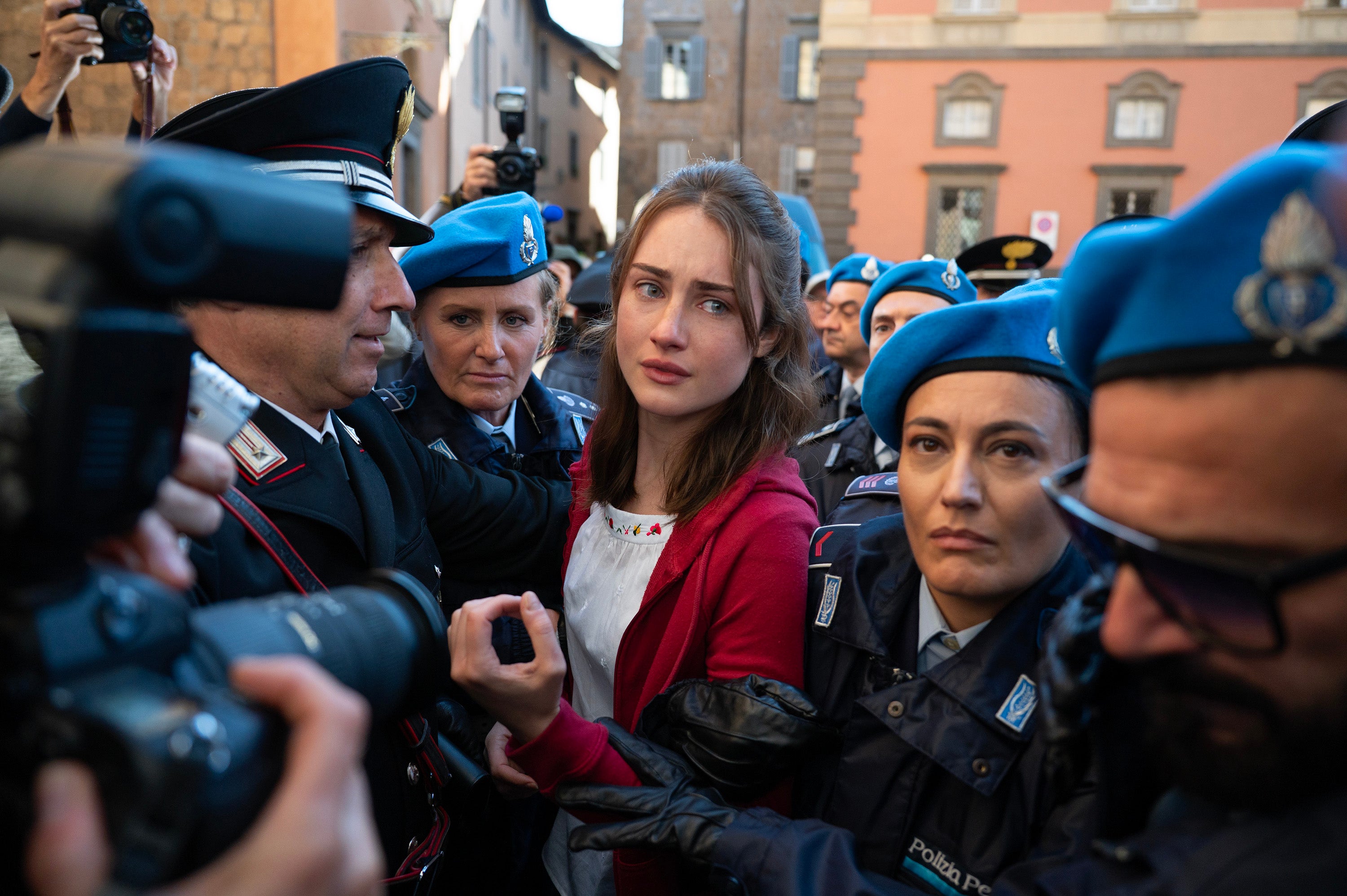 Knox (played by Grace Van Patten) was subject to a vicious trial by media outside the courtroom