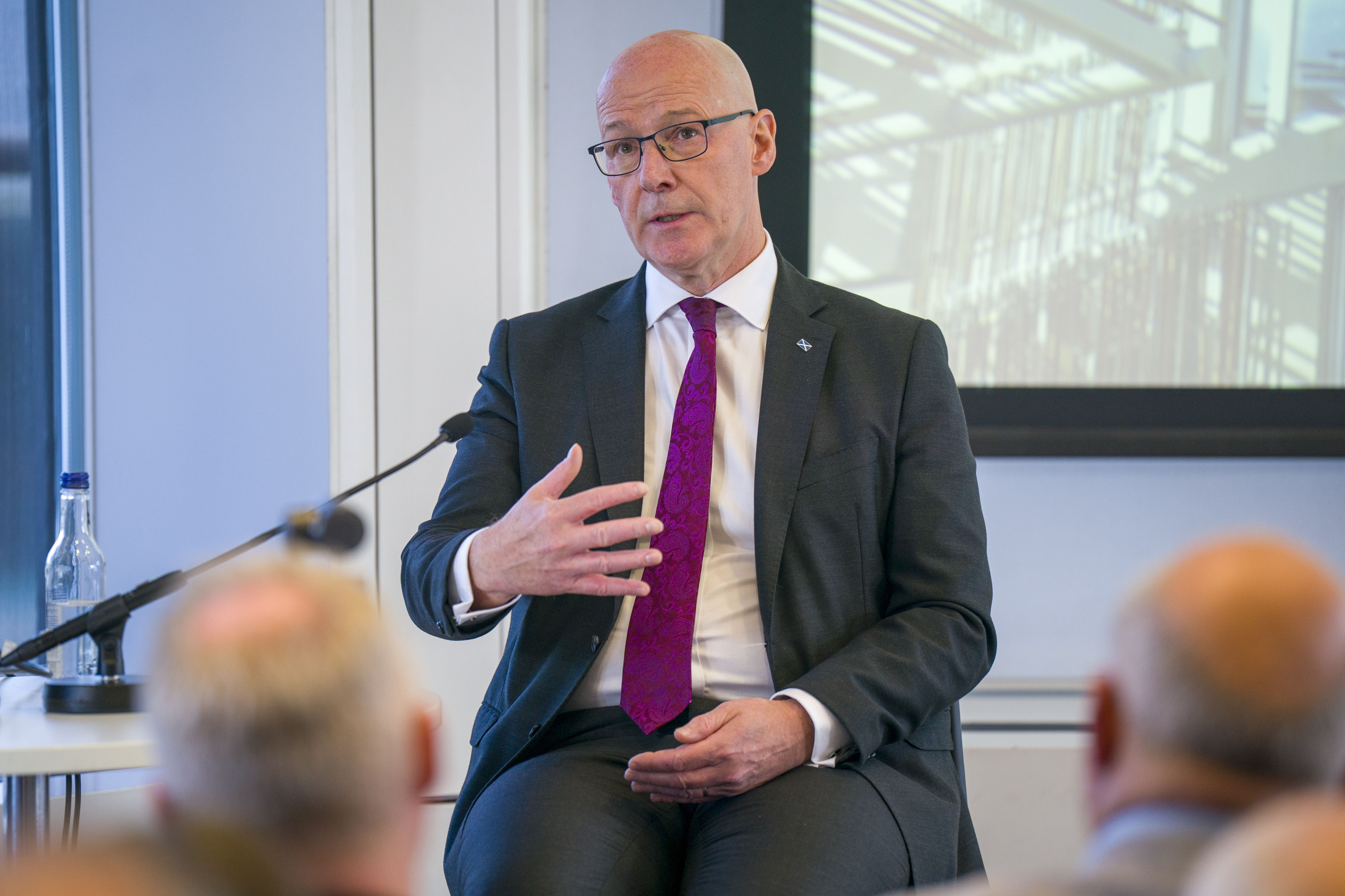First Minister John Swinney told an audience in Edinburgh he was focused on ‘the country and the future’, and refused to comment on claims Nicola Sturgeon made about her predecessor (Jane Barlow/PA)