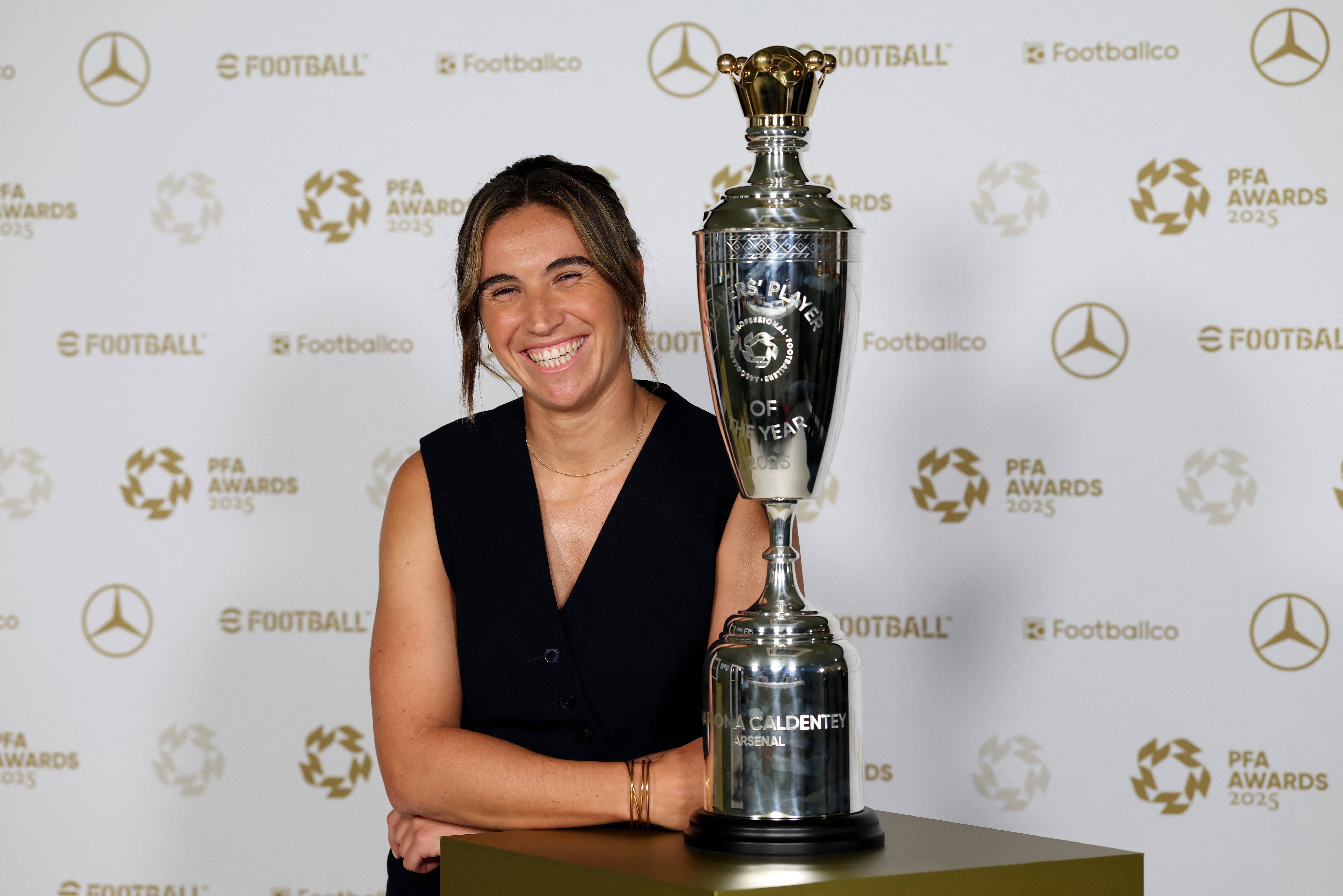Arsenal's Spanish midfielder Mariona Caldentey poses with the Women's PFA Players' Player of the Year award