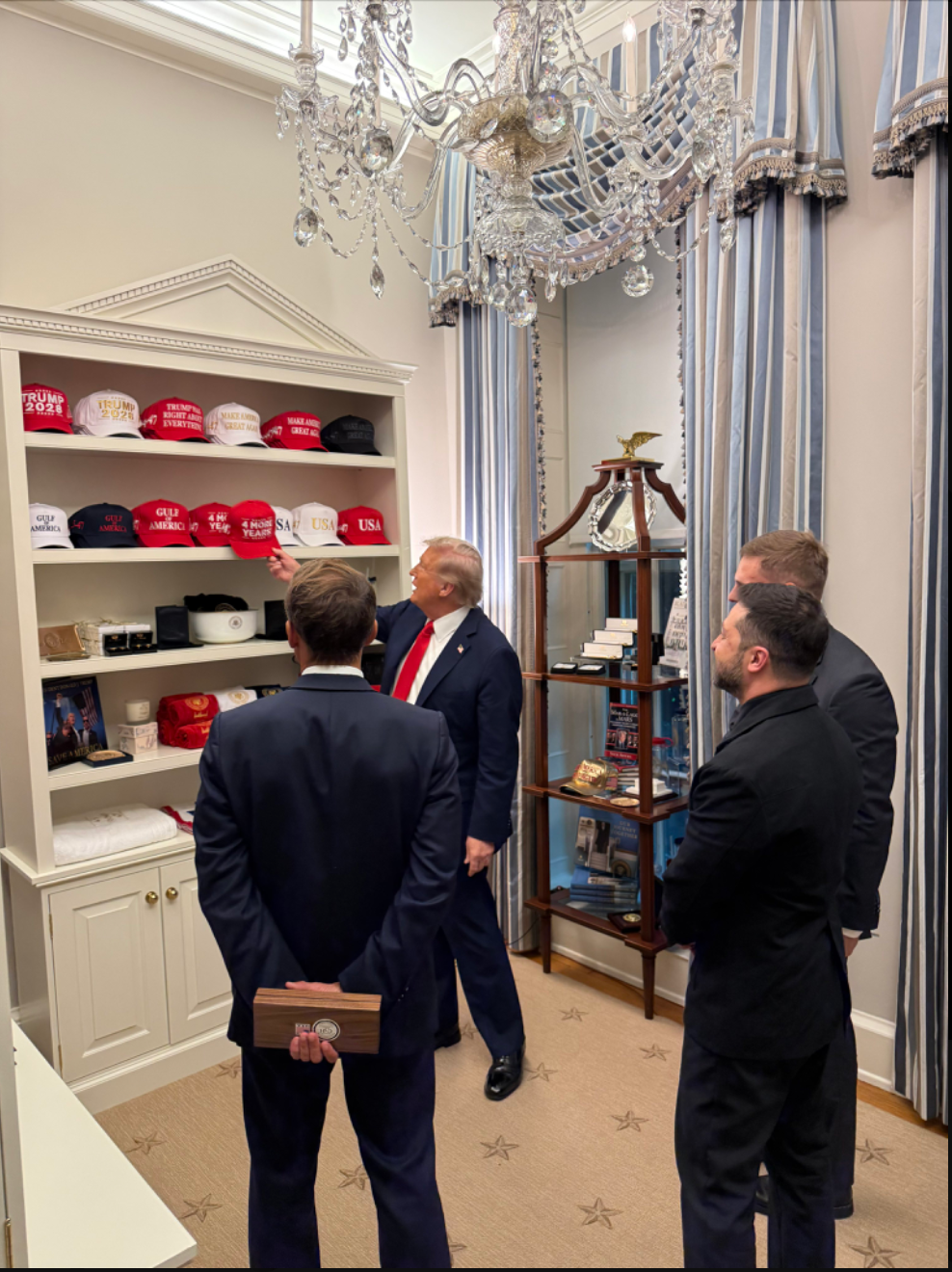 It’s not immediately clear what Zelensky’s reaction was to the MAGA merchandise