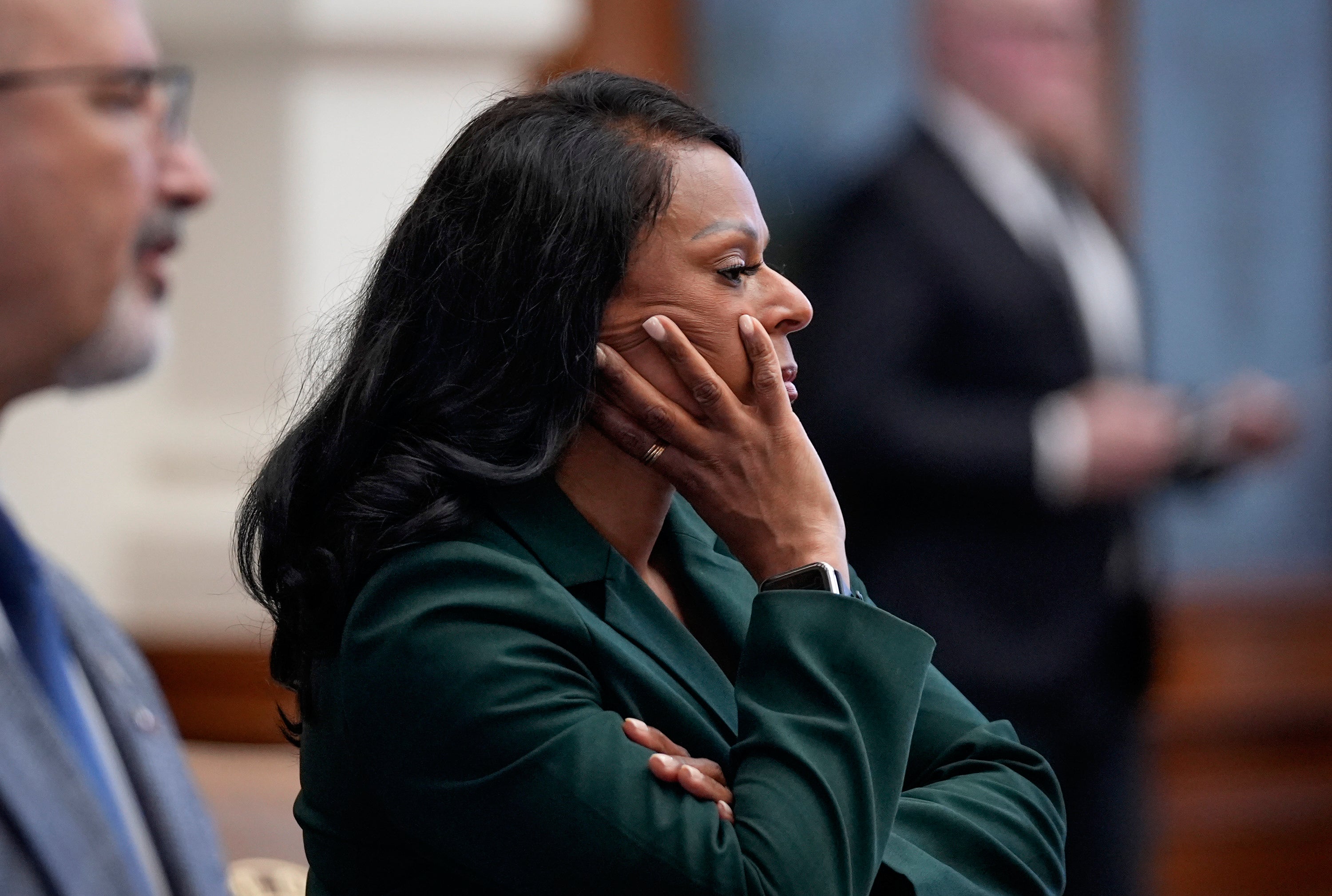 Texas State Rep. Nicole Collier listens to House Speaker Dustin Burrows announce the need for permission slips for Democratic state representatives to leave the House chamber in Austin on Monday August 18 2025