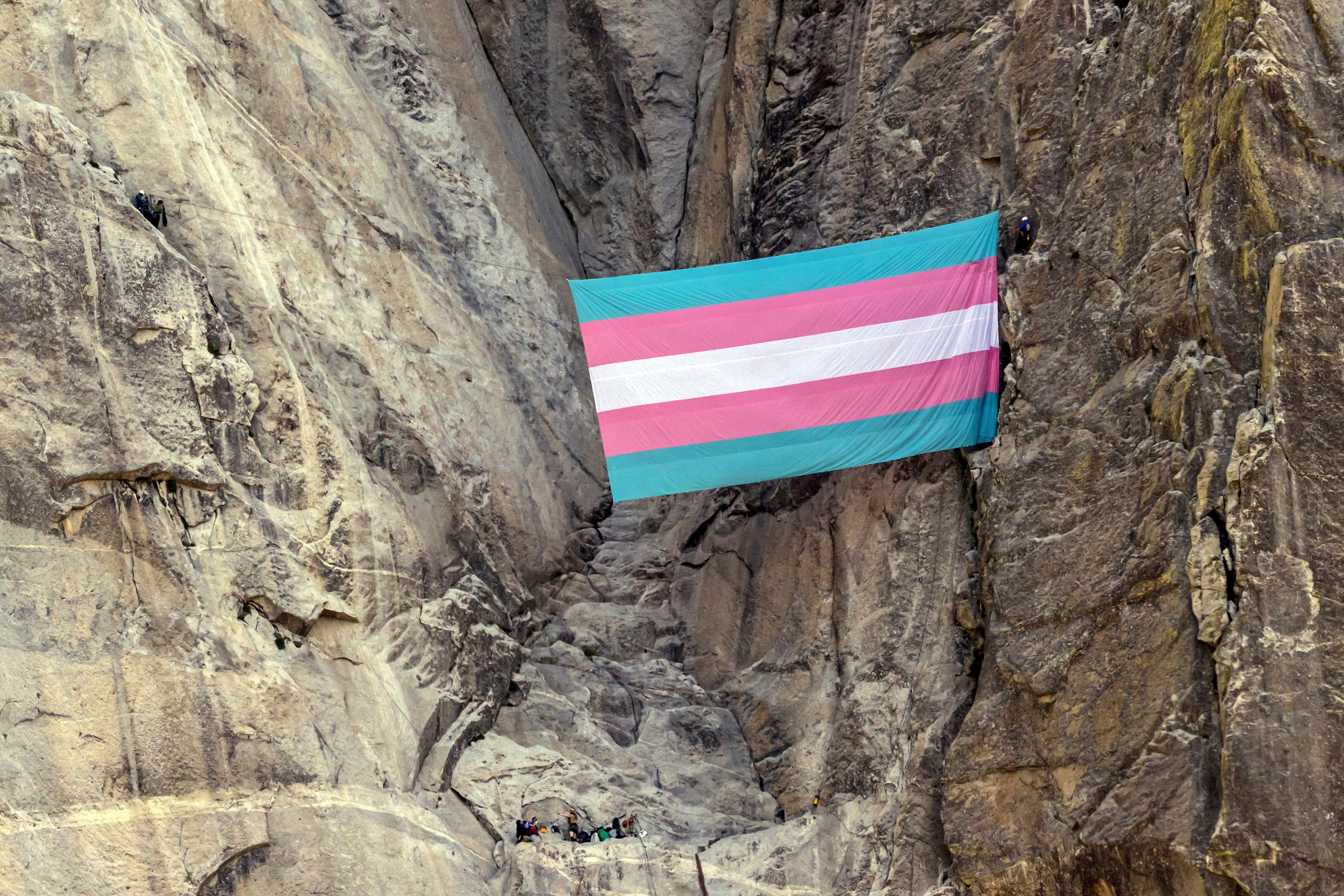 A Yosemite National Park ranger was fired after hanging a pride flag from El Capitan, and some visitors to the California park face potential prosecution for participating in a demonstration
