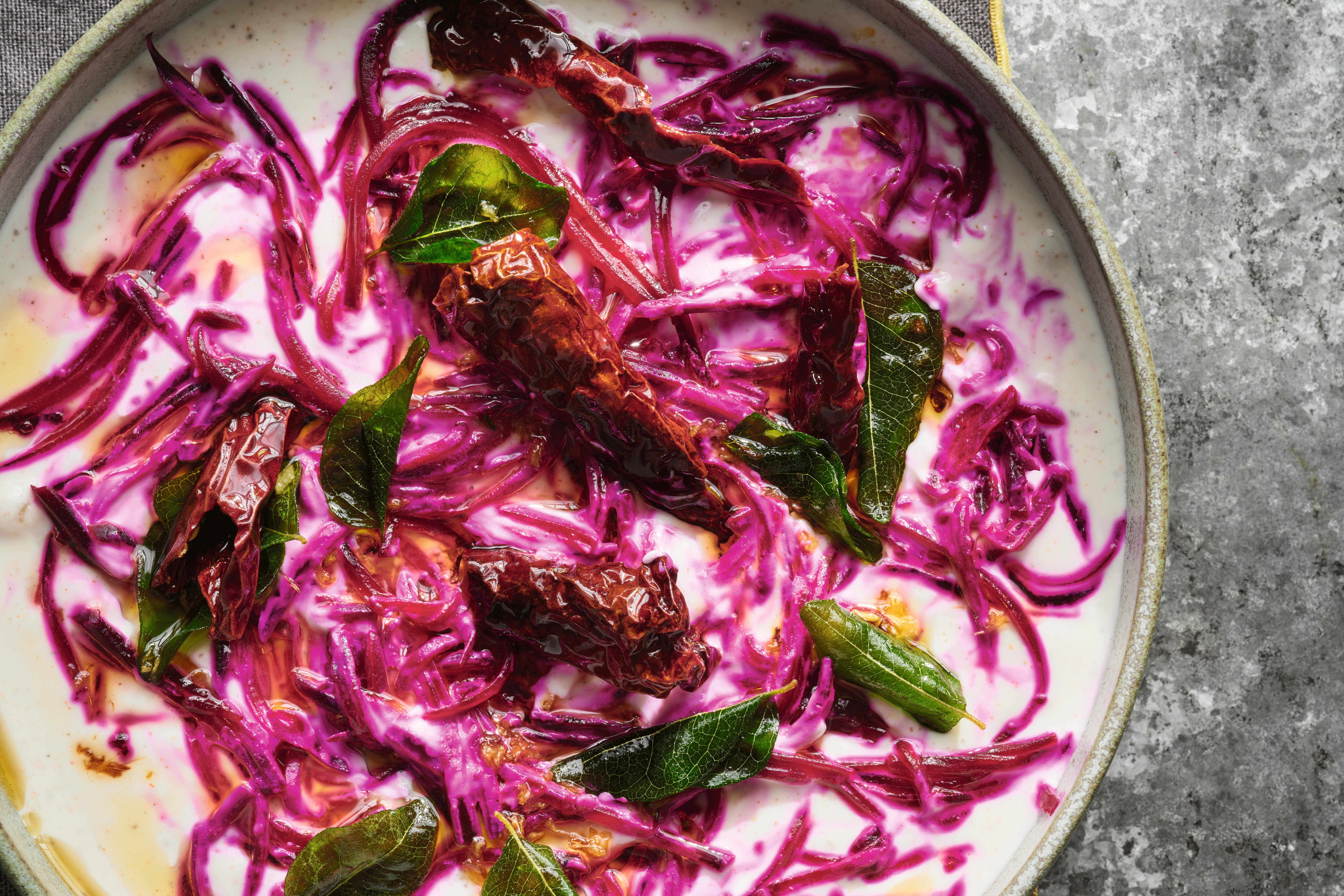A Kerala-style twist on a classic raita, where a sizzling coconut oil tempering brings the yoghurt and beetroot to life