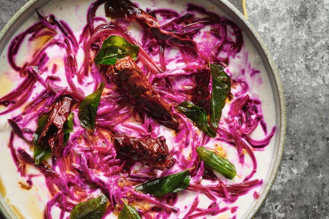 <p>A Kerala-style twist on a classic raita, where a sizzling coconut oil tempering brings the yoghurt and beetroot to life</p>