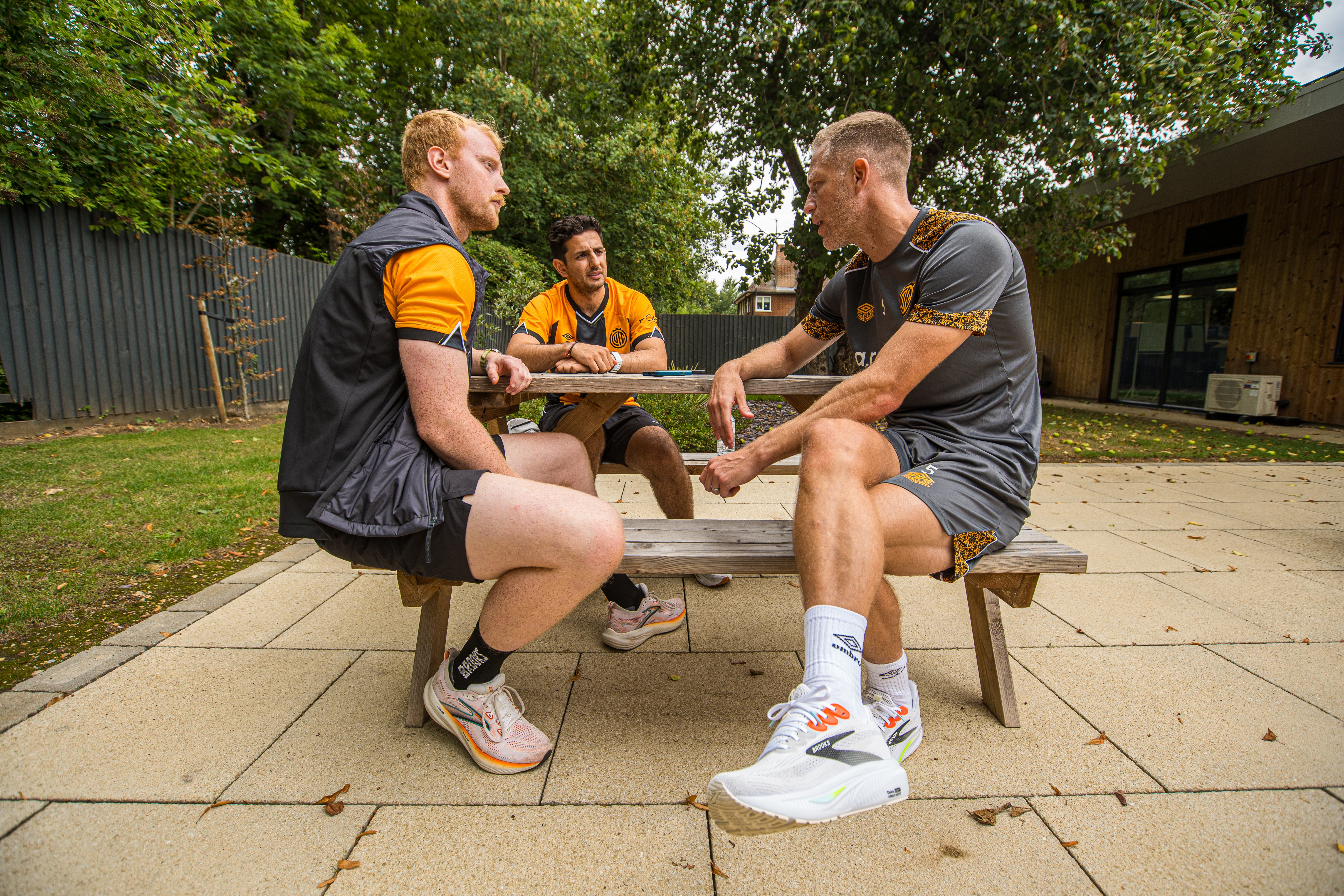 The Independent's senior fitness writer Harry Bullmore speaking with Cambridge United FC captain Michael Morrison during a Brooks Running event