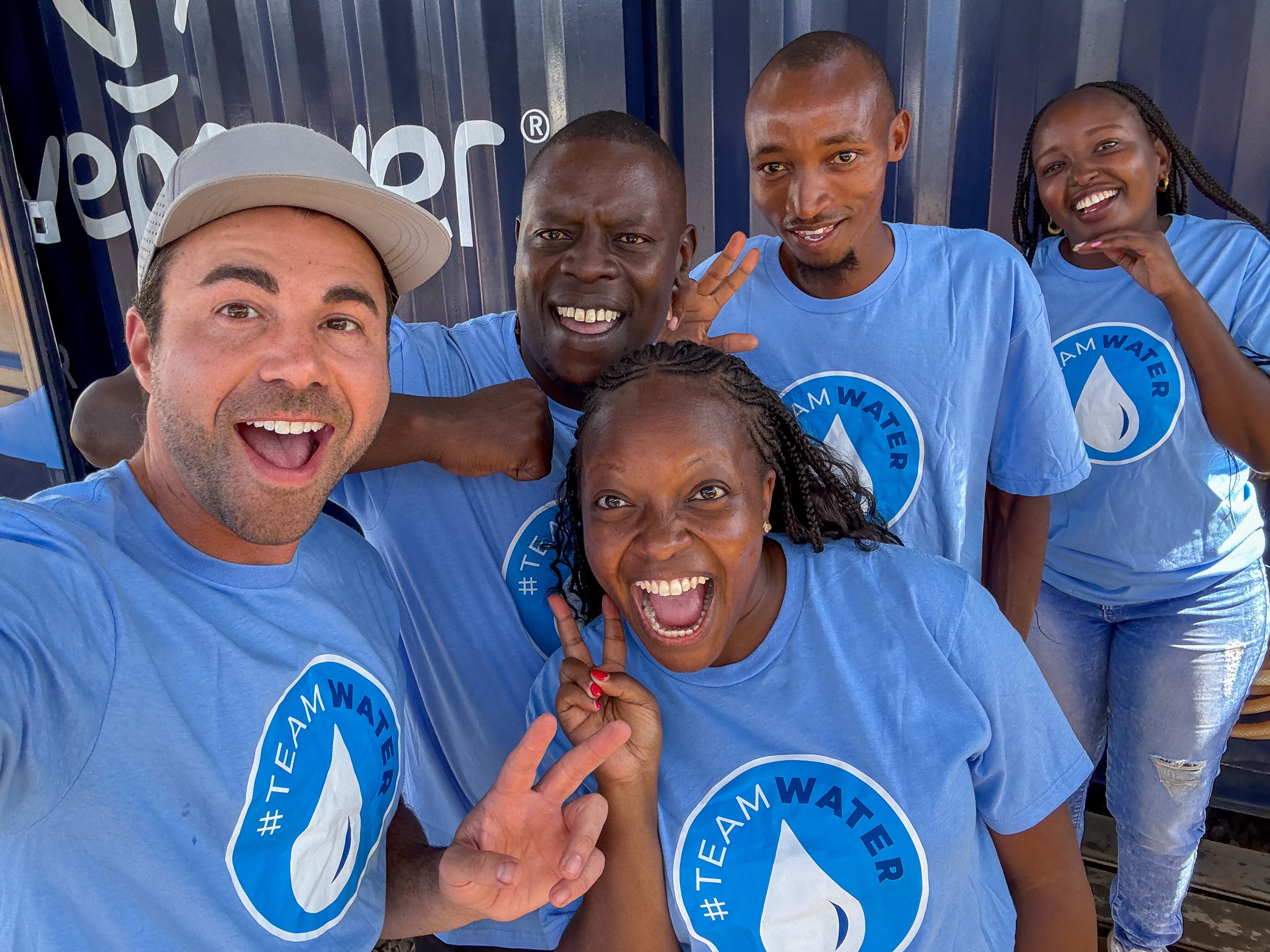 Mark Rober, another YouTuber driving #TeamWater, is pictured here with other supporters of the camoaign.