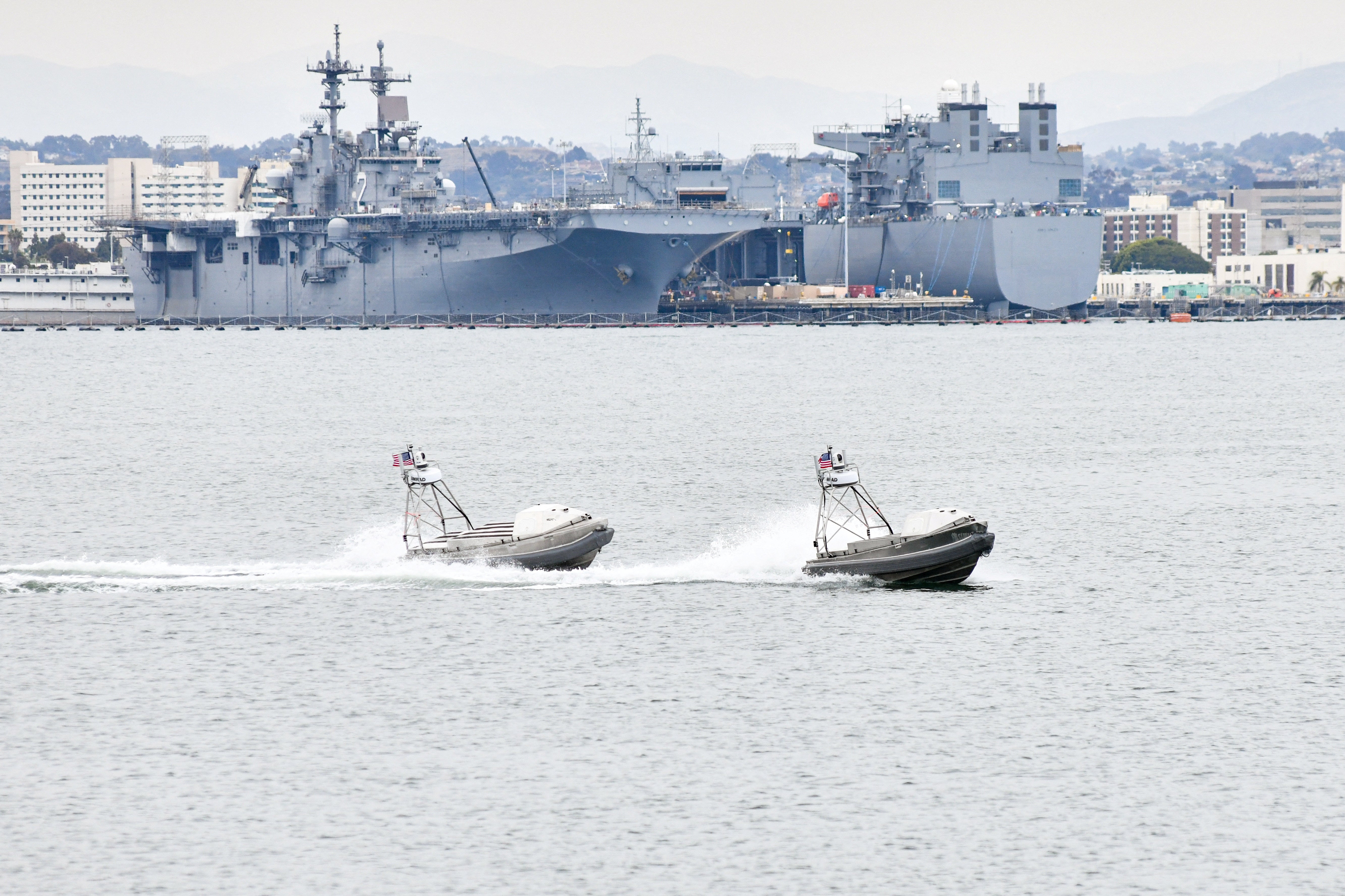 Autonomous vessels can be seen in the waters off San Diego, California, on May 14, 2024. The U.S. Navy is spending millions on testing the new technology.