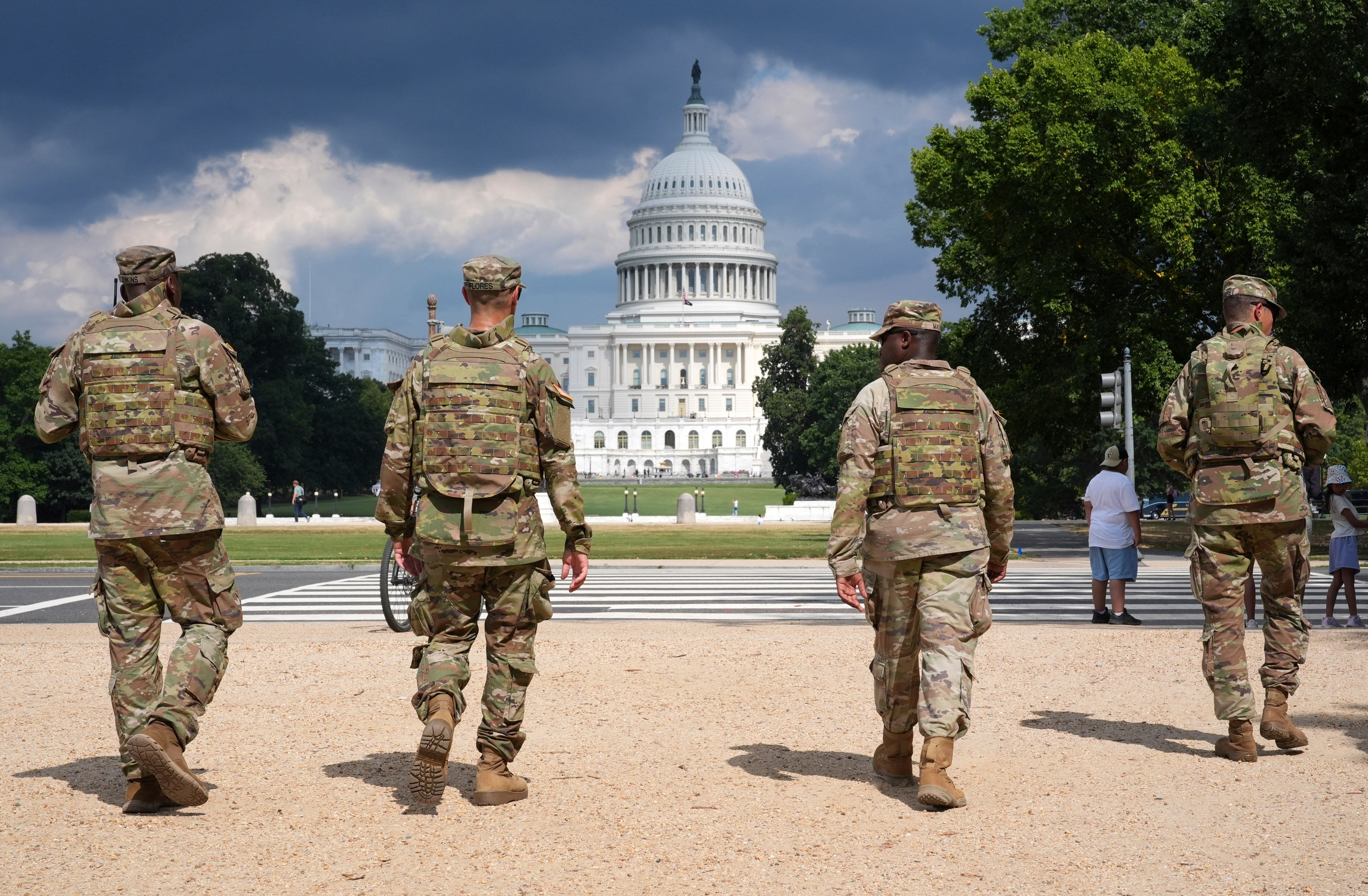 National Guard vehicle collides with civilian car near US Capitol, trapping one person
