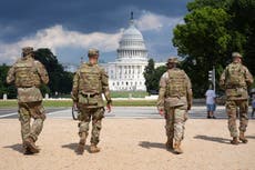 National Guard vehicle collides with civilian car near US Capitol, trapping one person