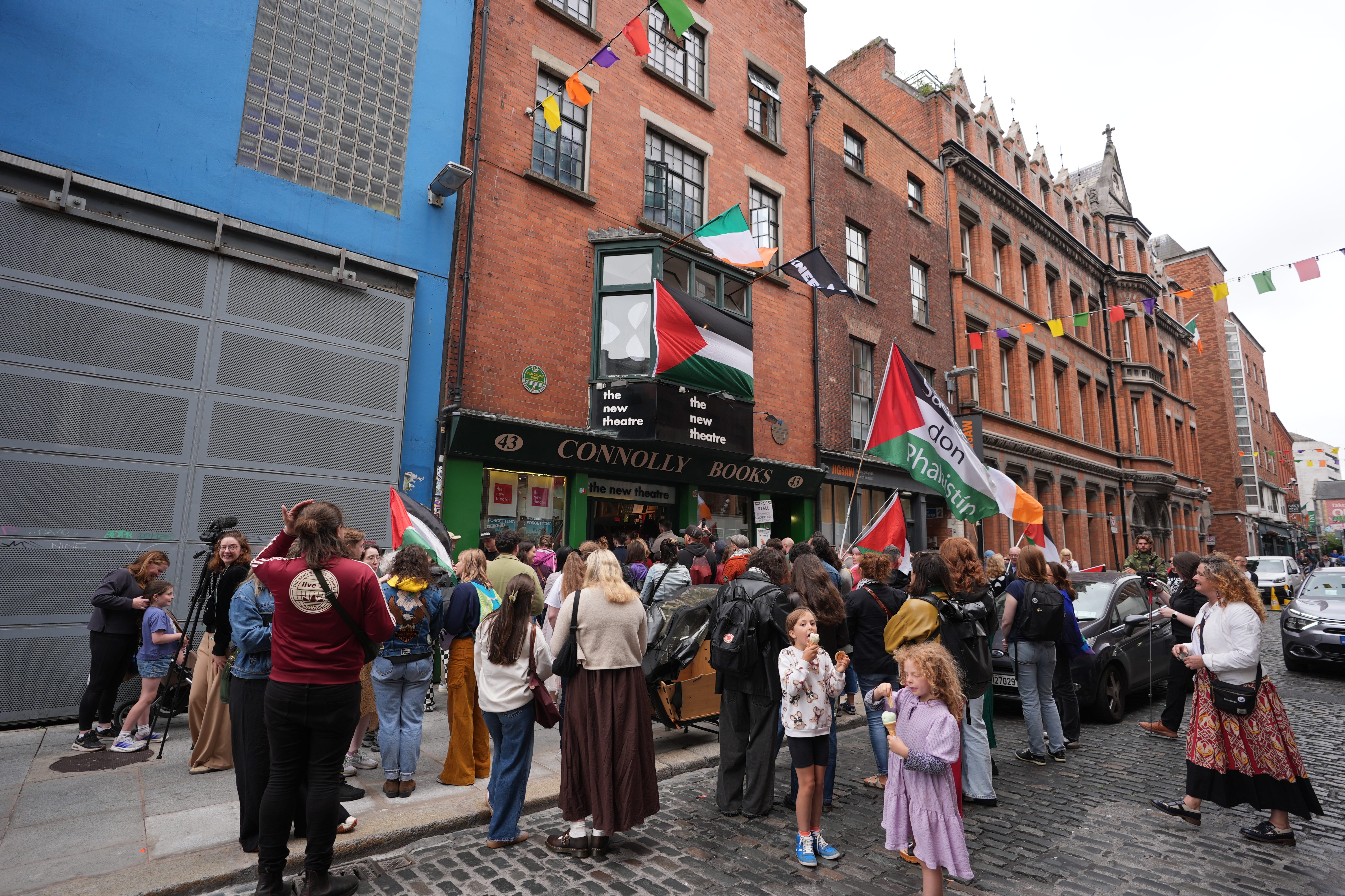 People attend a music session at Connolly Books in Dublin’s Temple Bar area to show solidarity for Kneecap’s Liam Og O hAnnaidh (Niall Carson/PA)