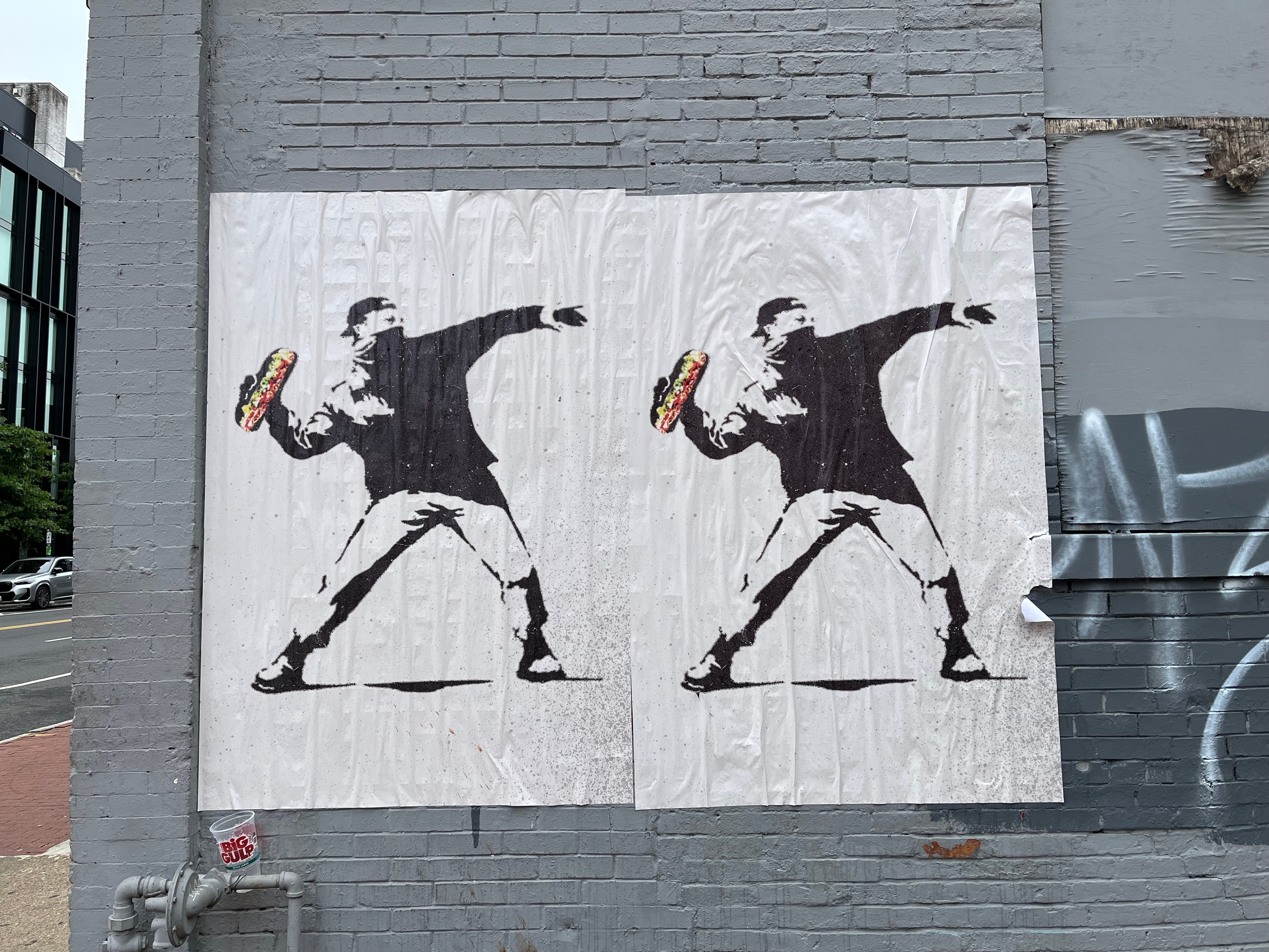 Federal agents arrested a protester for throwing a sandwich at them. Now artists are turning him into a resistance icon on the walls of DC