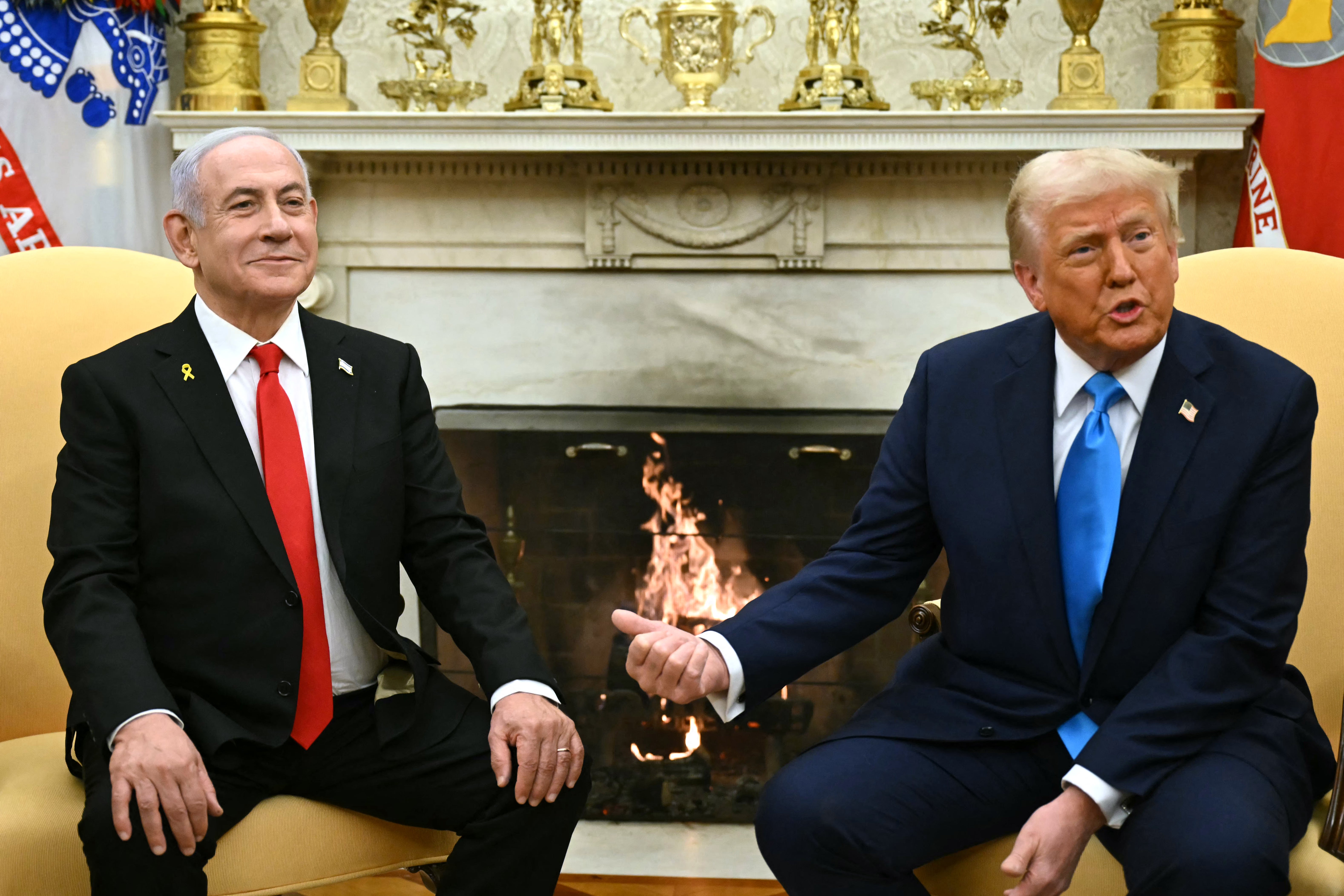 President Donald Trump meets with Israel's Prime Minister Benjamin Netanyahu in the Oval Office. Trump has referred to Netanyahu as a ‘war hero.’