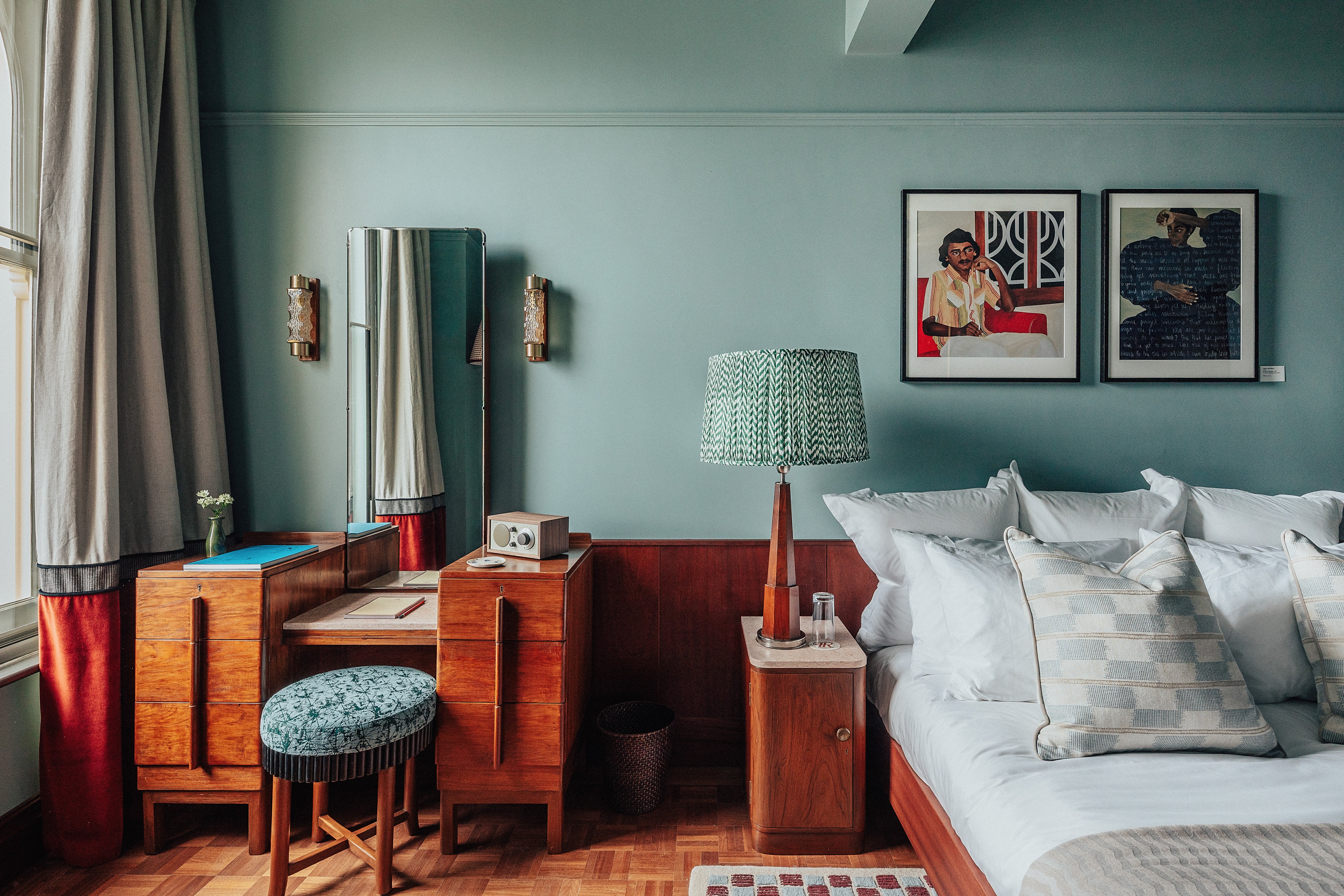 The lodgings at Dishoom's Permit Room feature two bedrooms done out in 1970s-inspired decor, with plush beds, curated artwork and gorgeous fabrics