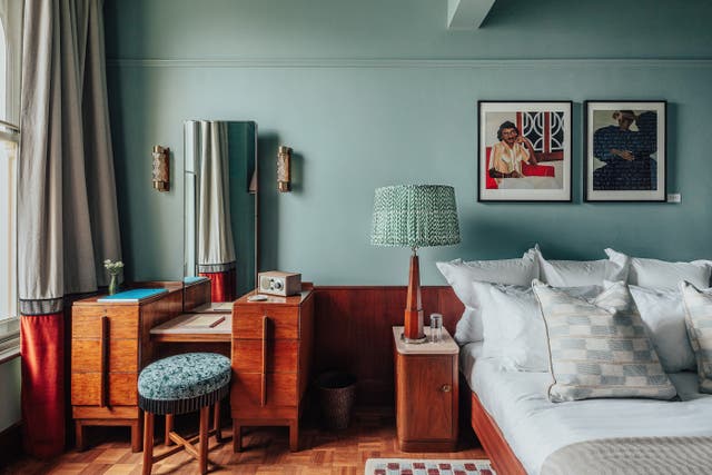 <p>The lodgings at Dishoom's Permit Room feature two bedrooms done out in 1970s-inspired decor, with plush beds, curated artwork and gorgeous fabrics </p>