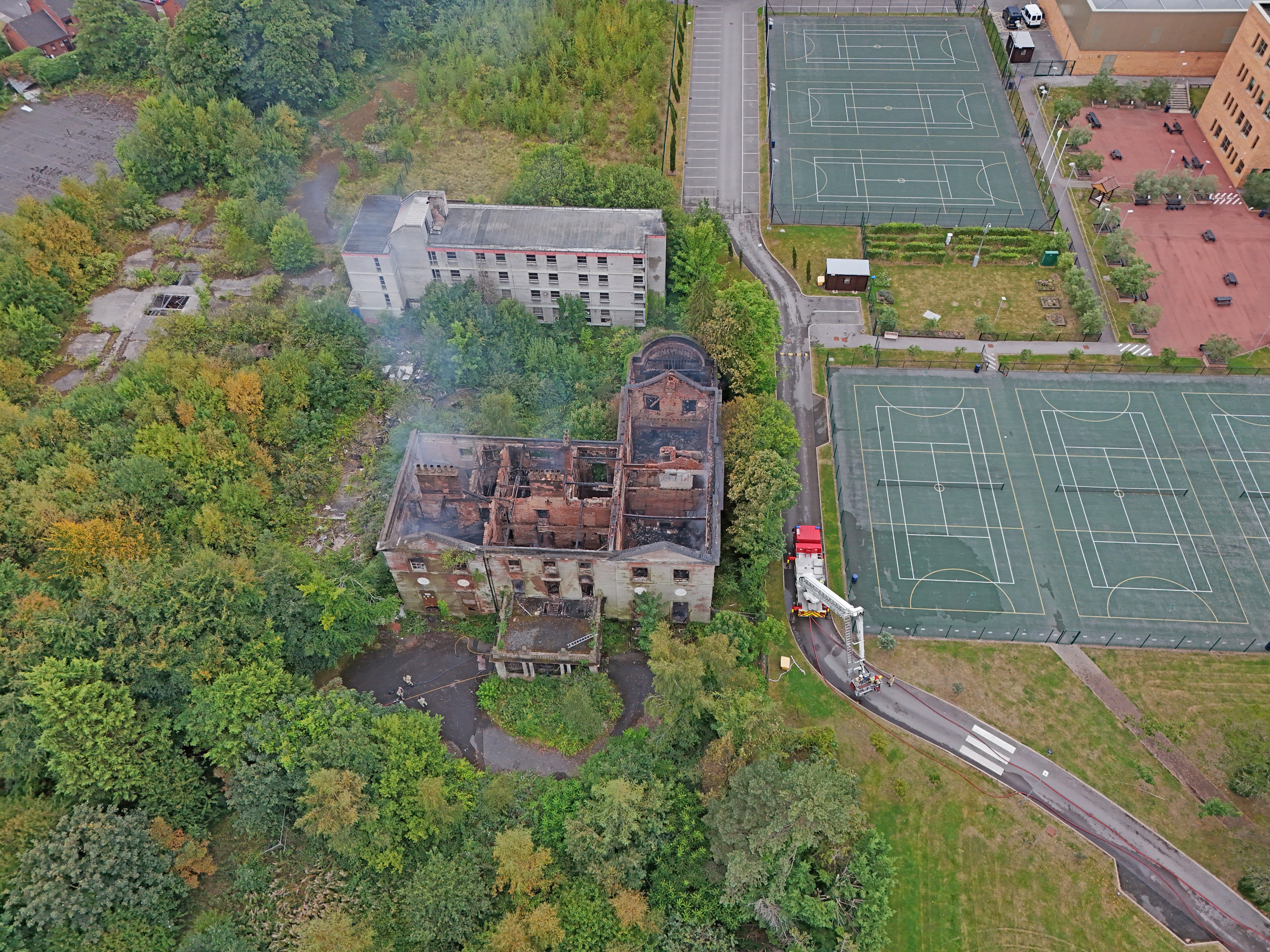 The aftermath of a huge fire at Woolton Hall in Liverpool