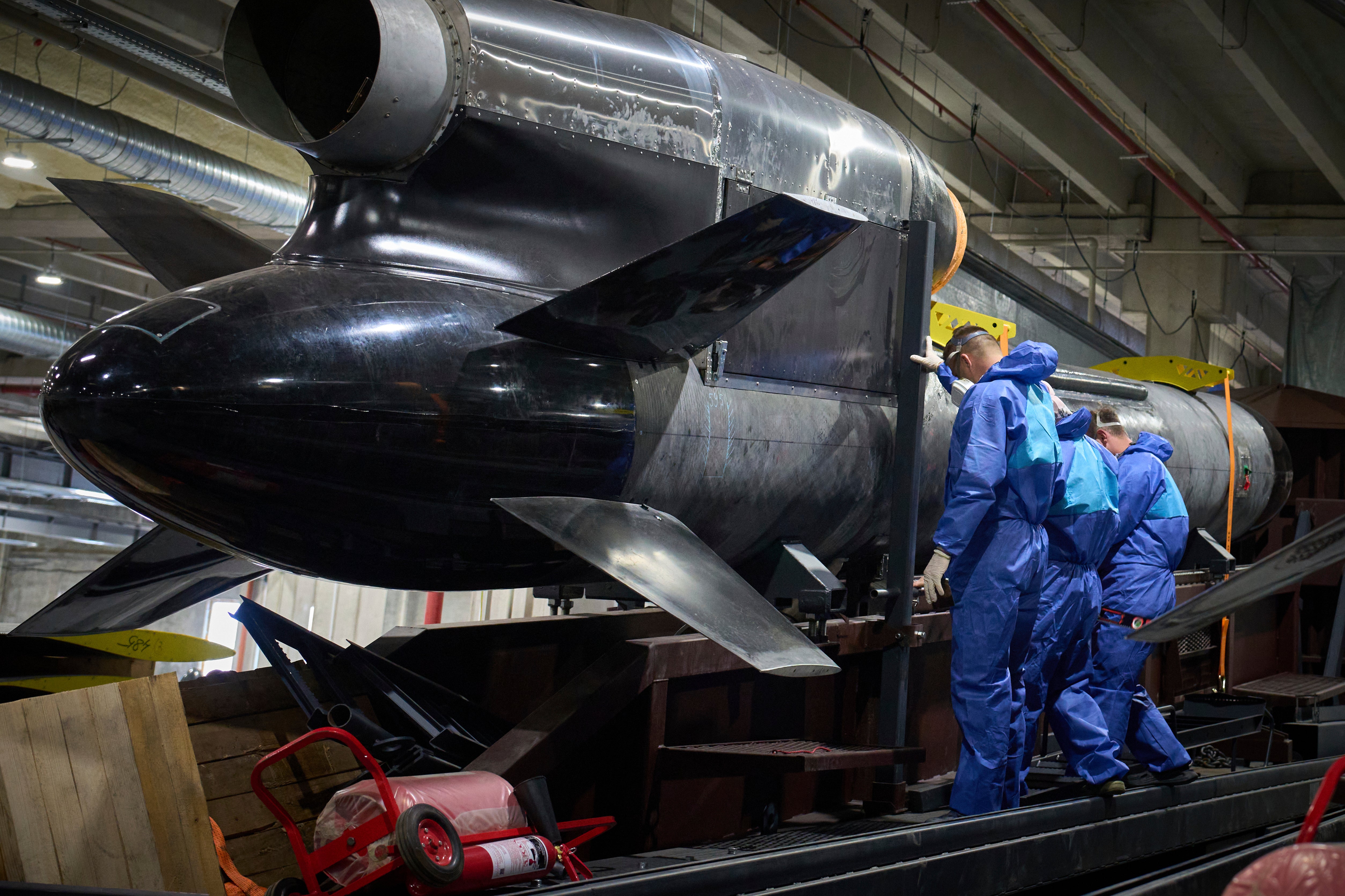 Workers inspect a Flamingo cruise missile at Fire Point's secret factory in Ukraine