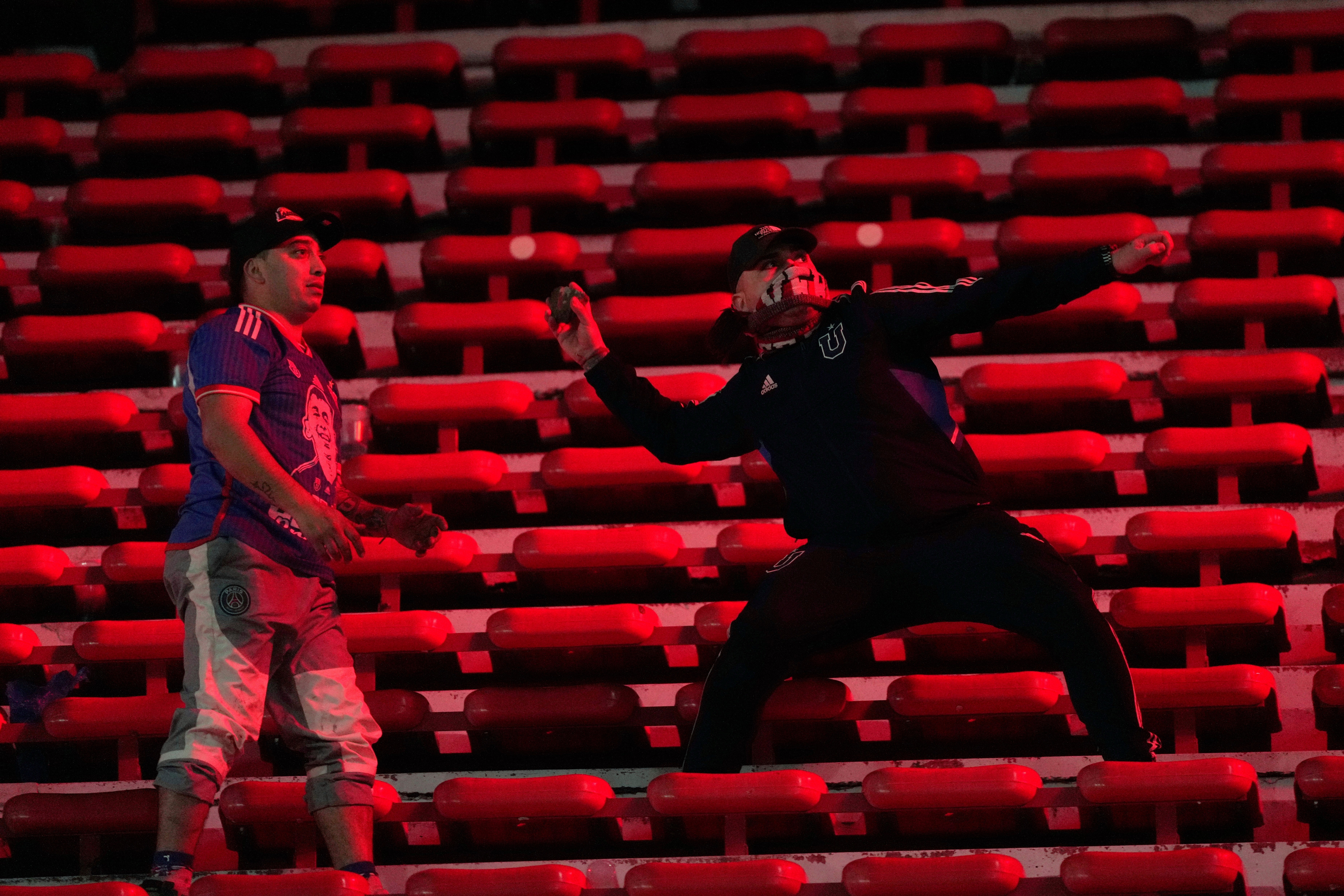 Clashing Universidad de Chile and Independiente fans attacked each other on Wednesday night