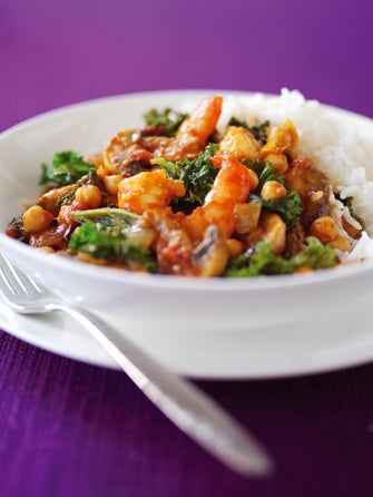 A fiery, fragrant curry that hides a generous handful of kale among the prawns and chickpeas