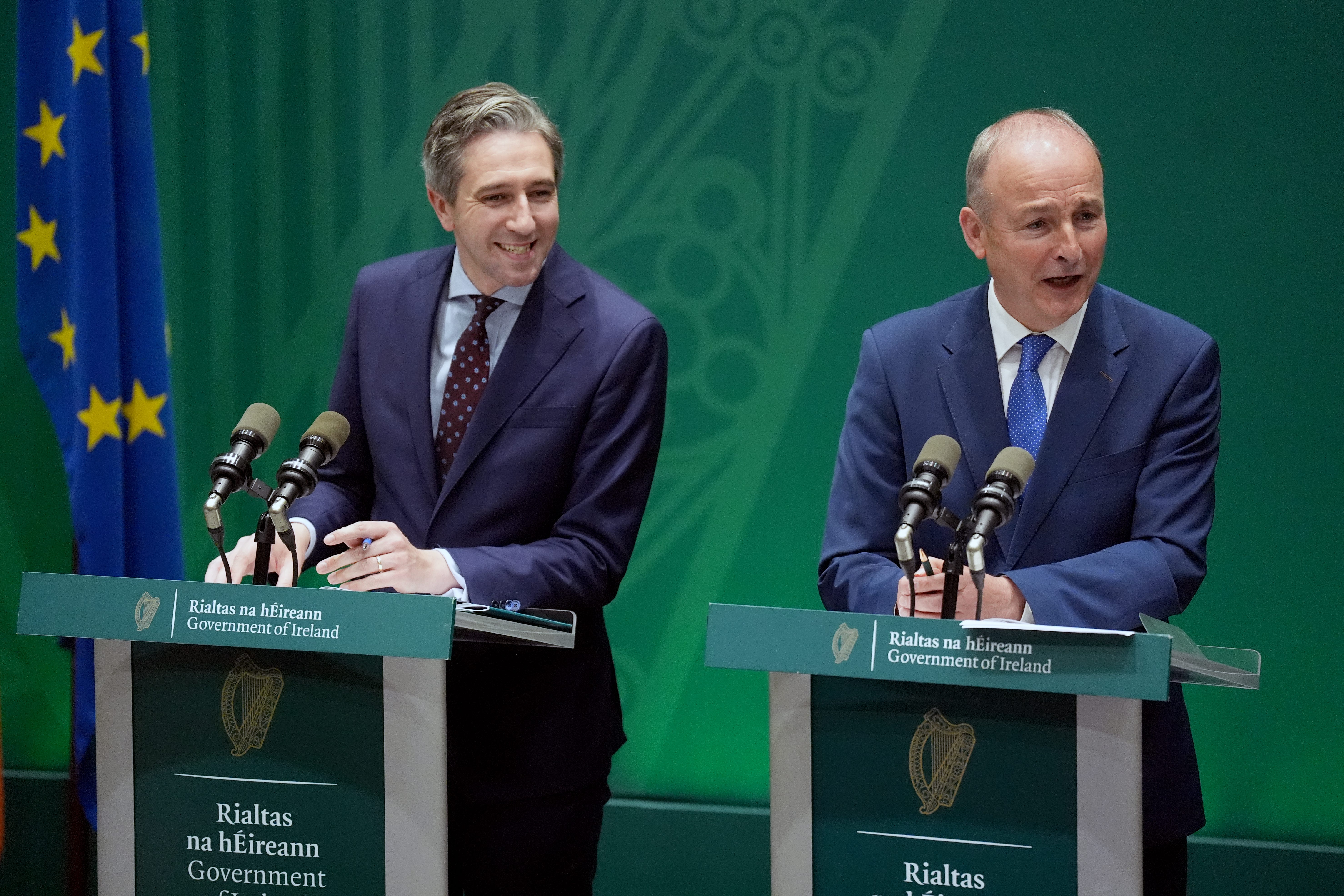 Tanaiste Simon Harris and Taoiseach Micheal Martin speaking to the media at a press conference (Niall Carson/PA)