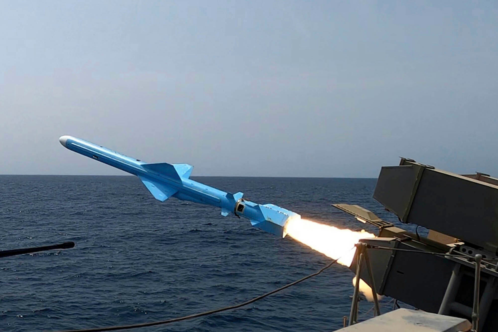 A missile is fired from a vessel during an Iranian navy drill in the Gulf of Oman