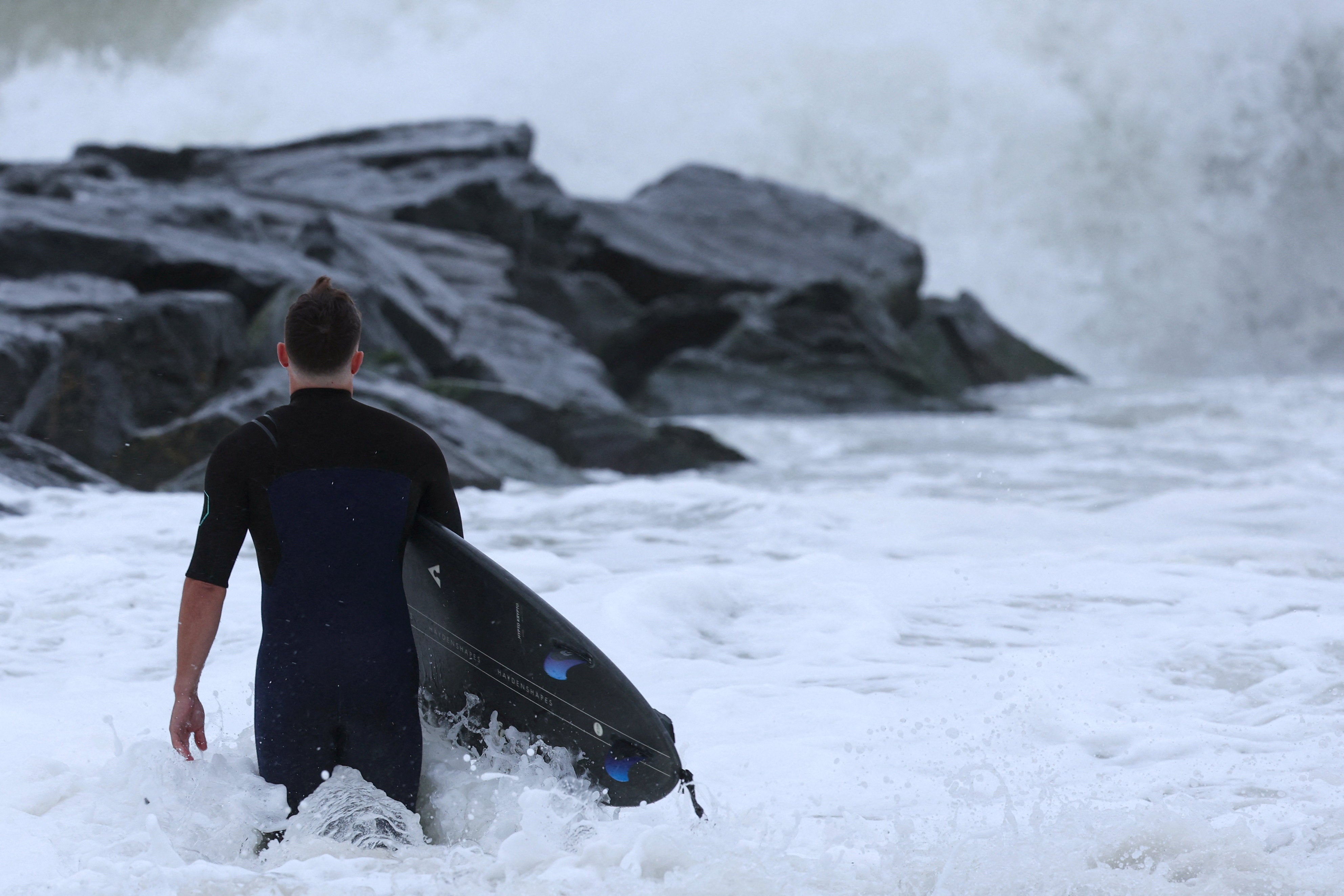 Forecasters predict that coastal areas could see up to five inches of rain and wind gusts of 50 to 60 mph by Sunday and there is risk for major and damaging coastal flooding, significant beach erosion and heavy surf
