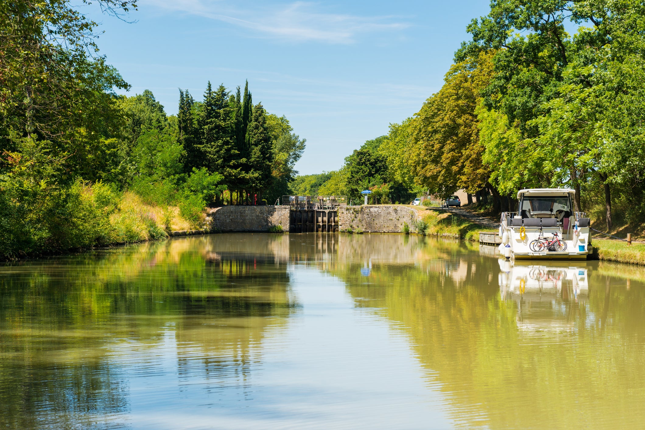 Visitors can cycle along the shaded waterways of the Canal du Midi