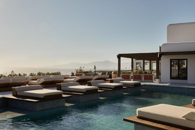 <p>The rooftop area of Anandes, Mykonos hotel features in-pool sun beds</p>