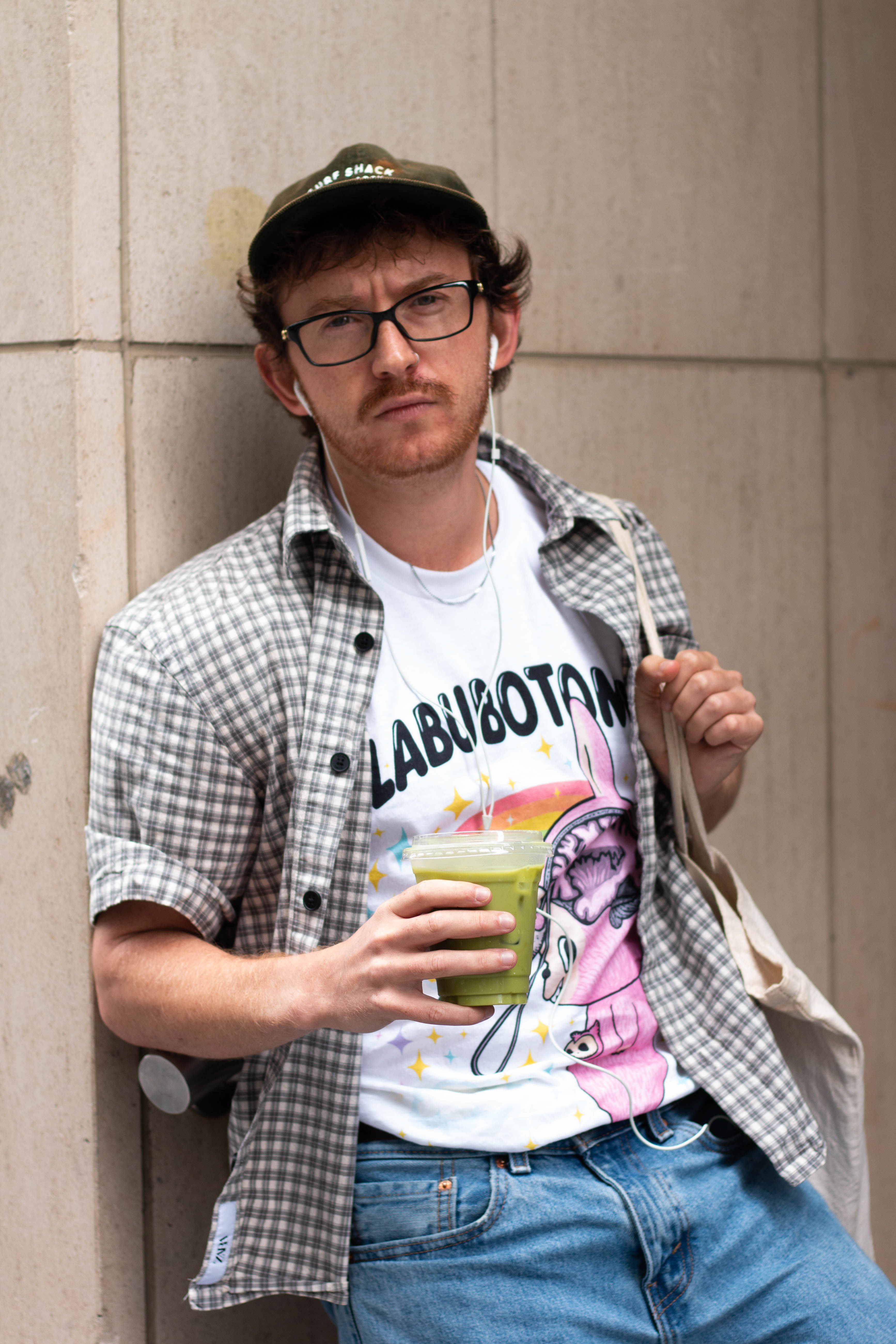 The Performative Man is often seemed armed with a tote bag and wired headphones. His only sustenance is Matcha lattes