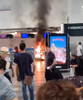 Passengers flee after man ‘sets fire to Milan airport check-in desk’