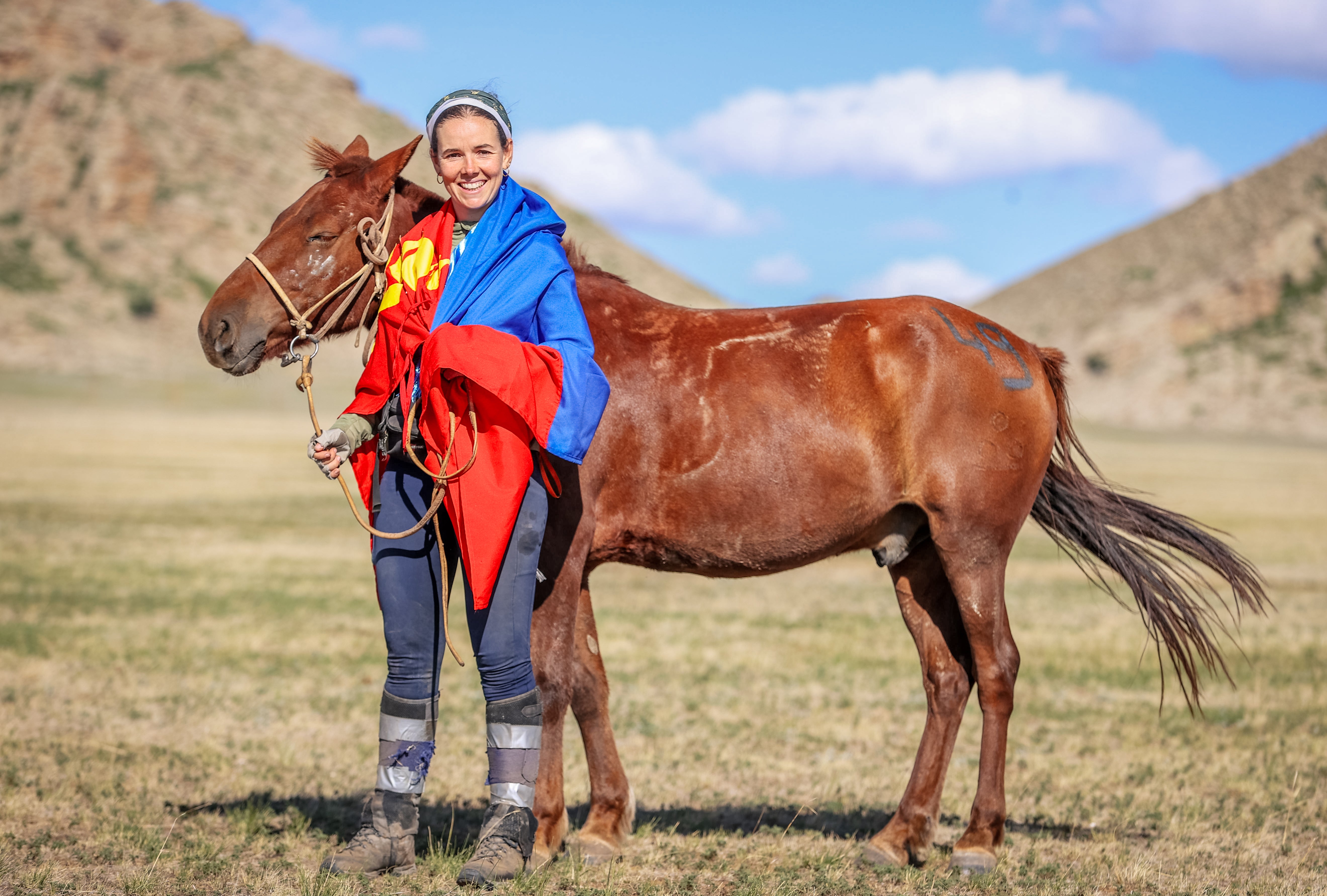 Anna Boden and one of the horses that helped her win the race