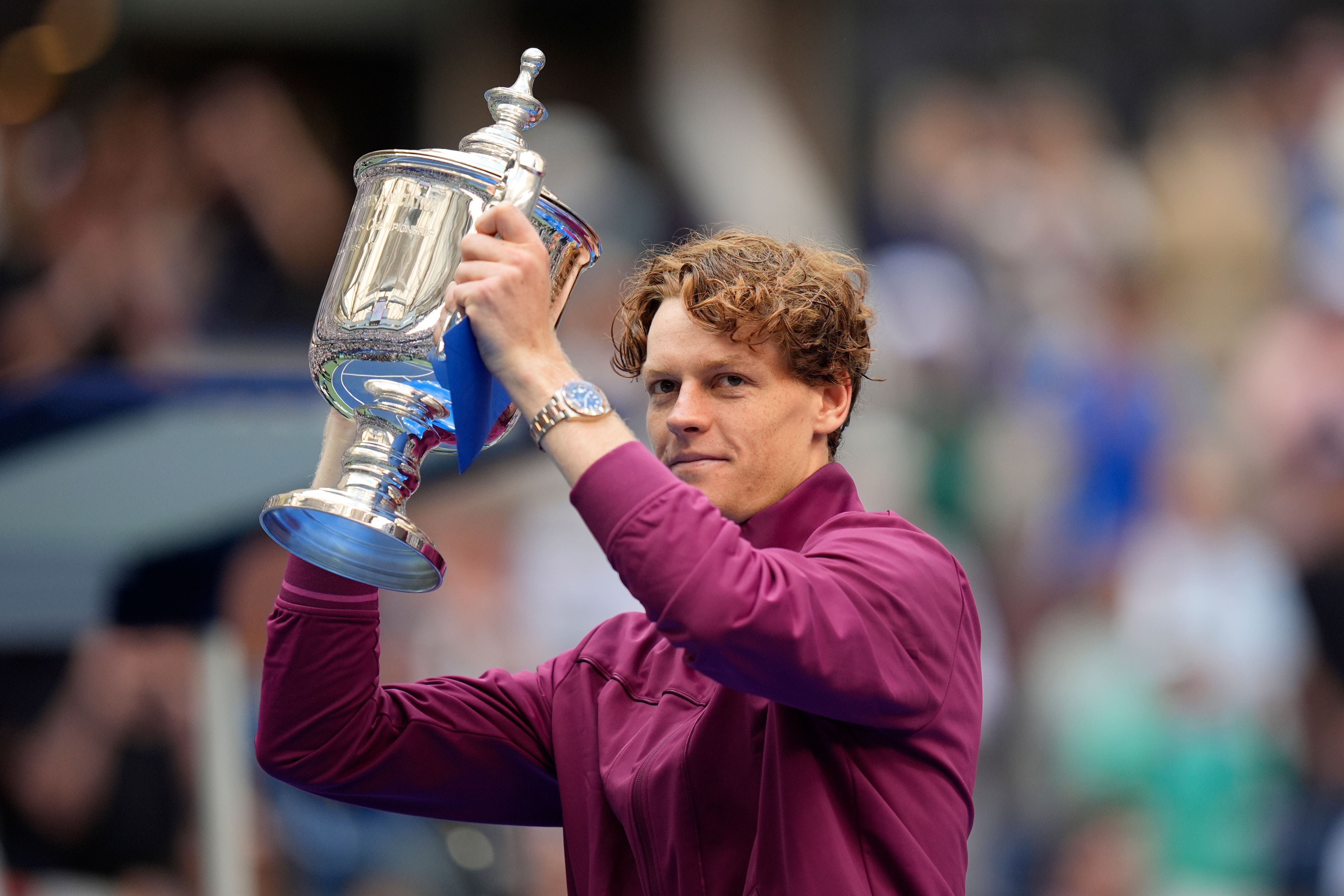 Jannik Sinner holds the US Open trophy (Seth Wenig/AP)